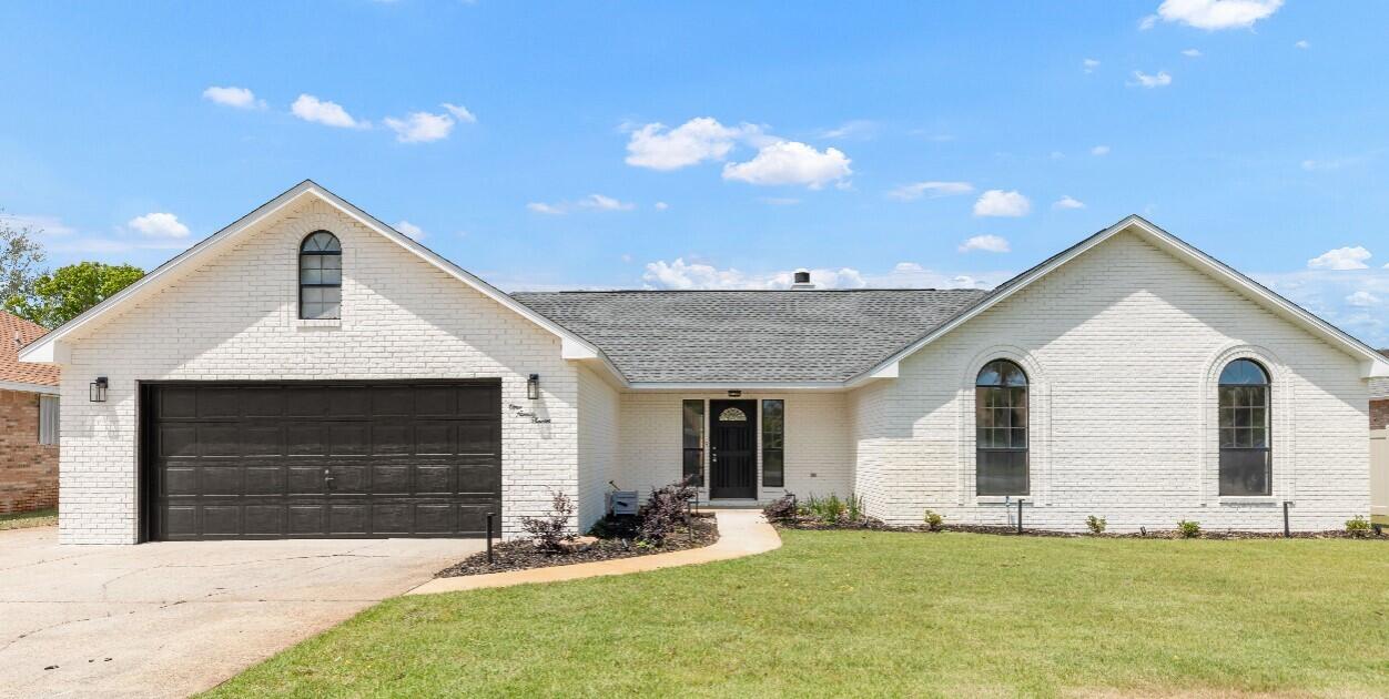 Totally remodeled and move in ready 3BR 2 BA gem in the highly desired community of Emerald Breeze Estates! Just 2.5 blocks from the sugar sand beaches, Destin Commons, top-rated restaurants, and premier golf courses, the location is unbeatable! Soaring cathedral ceilings and a bright formal living area featuring an electric fireplace. LVP flooring throughout. The new and spacious kitchen offers a breakfast bar and opens to a formal dining area, ideal for gatherings and entertaining. The large master suite boasts a walk-in closet, his/her vanities and a walk-in shower. Two additional bedrooms provide ample storage and comfort for family/guests. Enjoy the privacy of a fenced backyard with a screened-in patio and an extra outdoor patio space. NO HOA!