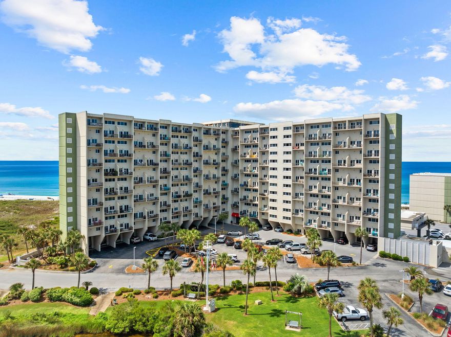 Welcome to Pinnacle Port, a beautiful coastal condo located in the gated Carillon Beach community.  Here you'll find stunning views of the Gulf and Lake Powell just a short drive from the fabulous restaurant and shopping amenities of Inlet Beach and Rosemary Beach.  Residents enjoy the ultimate coastal lifestyle...just steps to the beach, fishing on Lake Powell, and access to community boat slips.  Amenities include 2 pools, 4 tennis courts, shuffleboard, fitness center, steam rooms and more.  Conveniently located on the first level but at a second floor elevation, this condo has stunning views of the Gulf from the kitchen and living areas -- plus a first floor balcony -- while the primary bedroom upstairs has a private balcony overlooking Lake Powell.  Coastal life at its best!