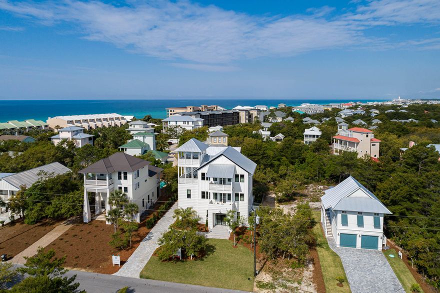 Introducing a brand new, luxury custom residence, poised in a prime location, on the east end of Scenic Highway 30A. This beach home conveys fully furnished, with high-end sleek interiors appointed 30A Design Group. Boasting a uniquely large site with an impressive pool deck and outdoor space for enjoying the coastal lifestyle. With strong annual rental revenue projected at +$250K, the spacious floor plan, with 5 bedrooms plus a bunk room, and an additional carriage house with upper loft, is ideal for large family beach gatherings or for maximizing a strong return on investment, as a vacation rental home. With two large master suites, it is ideal for multiple families to rent together. A short to the beach access,