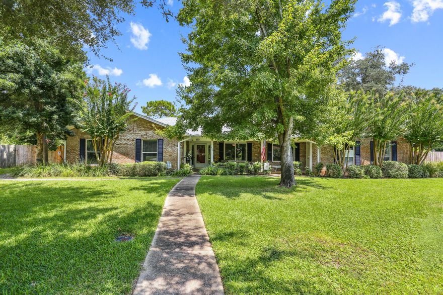 *** COME TAKE A LOOK ** This all-brick P-O-O-L home on sought-after Dracena Way is bursting with possibilities! Whether you're looking for a comfortable single-family residence, a multi-generational living setup, or a property with short-term rental income potential, this home truly checks all the boxes. Ideally situated just minutes from Gulf Breeze schools, Shoreline Park, and the sugar-white sands of Pensacola Beach, the location simply can't be beat. Featuring 4 bedrooms and 3 full bathrooms, this beautifully updated home includes two private suites, each with its own private entrance, full bathroom, kitchenette, and washer--perfect for extended family, guests, or short-term rentals. Inside the main living space, you'll love the fully updated kitchen with granite countertops, tile back backsplash, a large center island with breakfast bar, and ample cabinet space. The kitchen opens to a cozy great room with fireplace and flows seamlessly into an expansive 18' x 18' screened patio overlooking the sparkling in-ground pool great space for outdoor living and entertaining. At the front of the home, a bright and spacious living/dining combo welcomes you with abundant natural light and a warm, inviting feel. Additional highlights include: Updated bathrooms with beautiful tile finishes, Gorgeous tile flooring throughoutNO carpet! Impact-resistant windows, 2021 Roof with clips & New Water Heater to be installed, Duct work replaced and UV light system installed, Pool pump & liner 2106, sprinkler pump replaced 2025 and more... Side-entry 2-car garage, Fully fenced backyard. This home offers the best of Gulf Breeze Proper living, with easy access to parks, tennis courts, skate park, library, and the world-famous Pensacola Beach just minutes away.