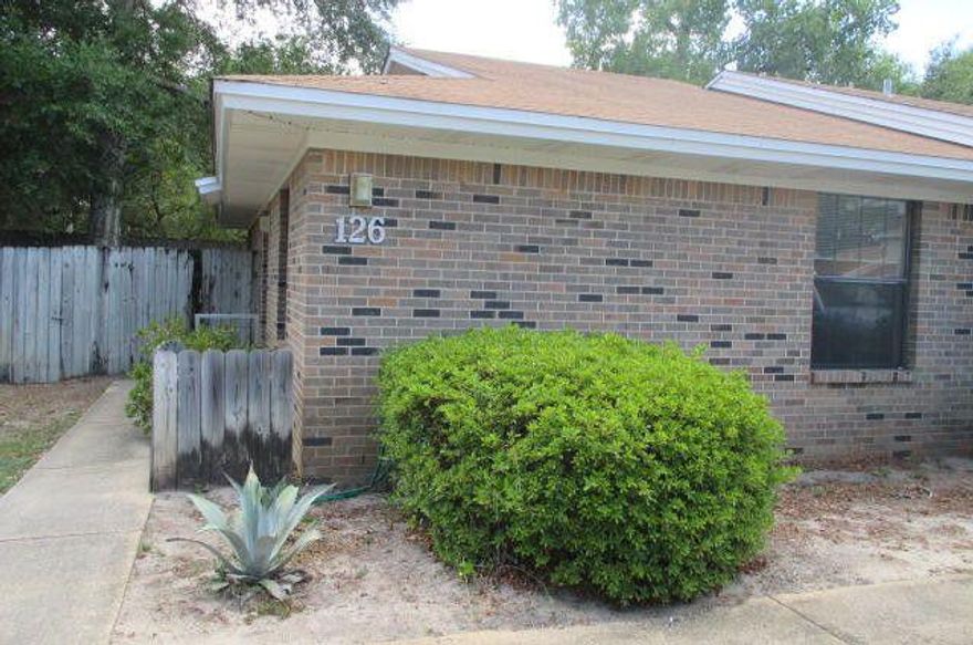 Cute 2 bedroom 1 bathroom townhome walking distance to shopping and restaurants. Privacy fenced yard with shade tree, patio, and outside storage. Fresh paint completes this unit and it's ready for move in! No smoking and no pets. $25 Trash fee is included in rent amount. Call office for showing.