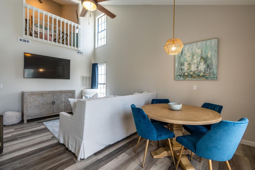 Welcome to 41A, a fully updated, fully furnished two bedroom, two bathroom, 960 sq ft floorplan carefully curated to encompass a coastal luxe feel throughout. Every room has been thoughtfully planned to maximize efficiency and comfort through space optimization, plush fabrics and quality finishes throughout.A private outdoor patio that overlooks the tennis courts and one of the Horizon South community pools welcomes you to the unit. This terrace area faces south, meaning year round sun can be enjoyed from your new, weather rated outdoor furniture set and large umbrella. Imagine having your coffee on your porch in the mornings as the early morning sun rises on one side and ending each day with stunning views of sunset as it sets on the other side.