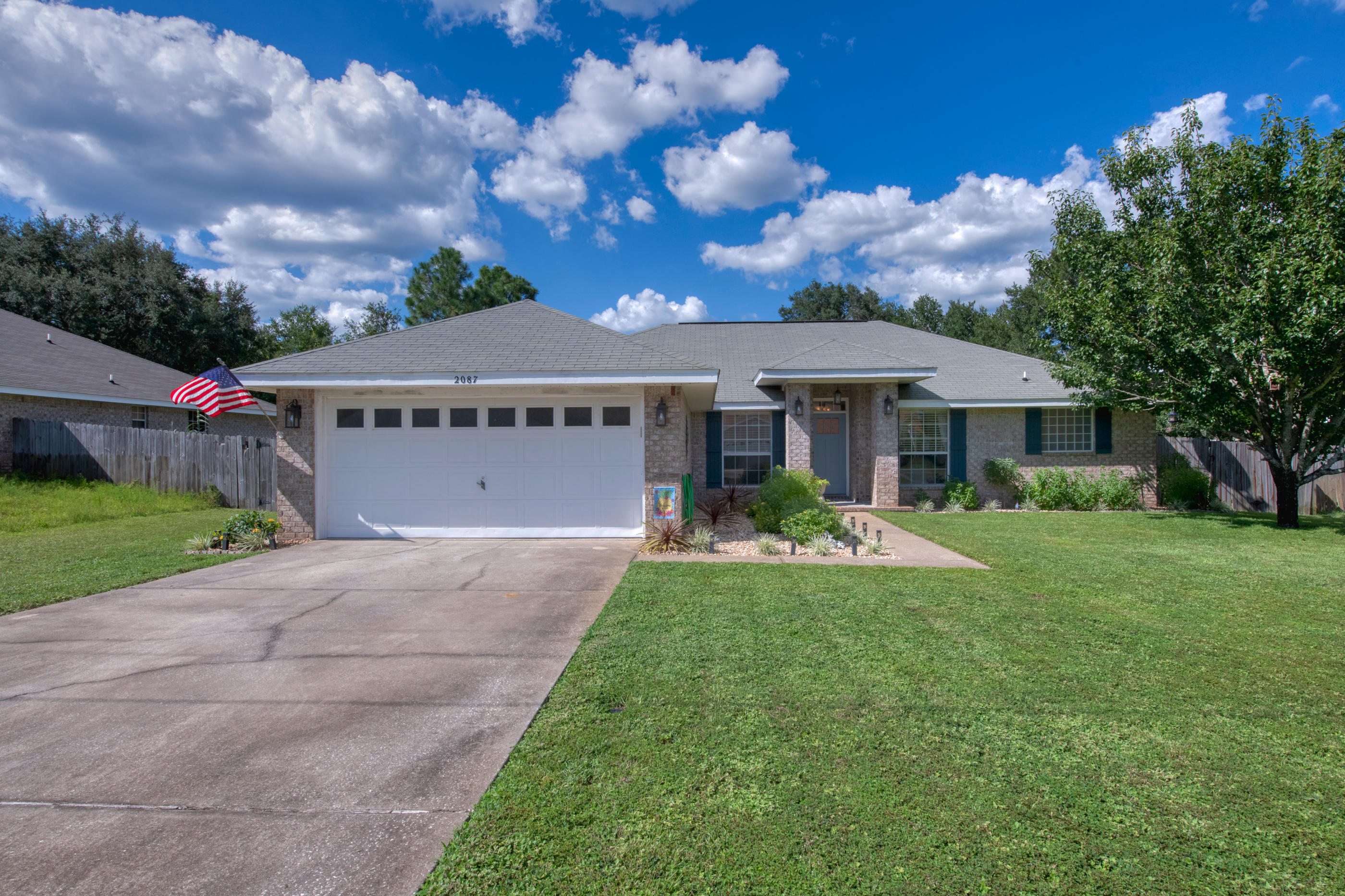 This recently updated, well maintained, open concept home with flex space is now available! There is not a stitch of carpeting, with tile in the main areas plus new wood laminate flooring in all bedrooms. Beautiful built-ins in the flex room are perfect for a home office. You will love the upgrades that have turned the house into a home such as the crown molding, modern light fixtures, and subway tile back splash in the kitchen. This house comes with some extras such as a Ring doorbell, ecobee thermostat, curtains and rods, and some decorative shelving in the dining room. The water heater was replaced in 2015 and the garbage disposal still has a 3 year warranty that will transfer to the new owner. Enjoy the great curb appeal, low maintenance landscaping, and large fenced in yard.