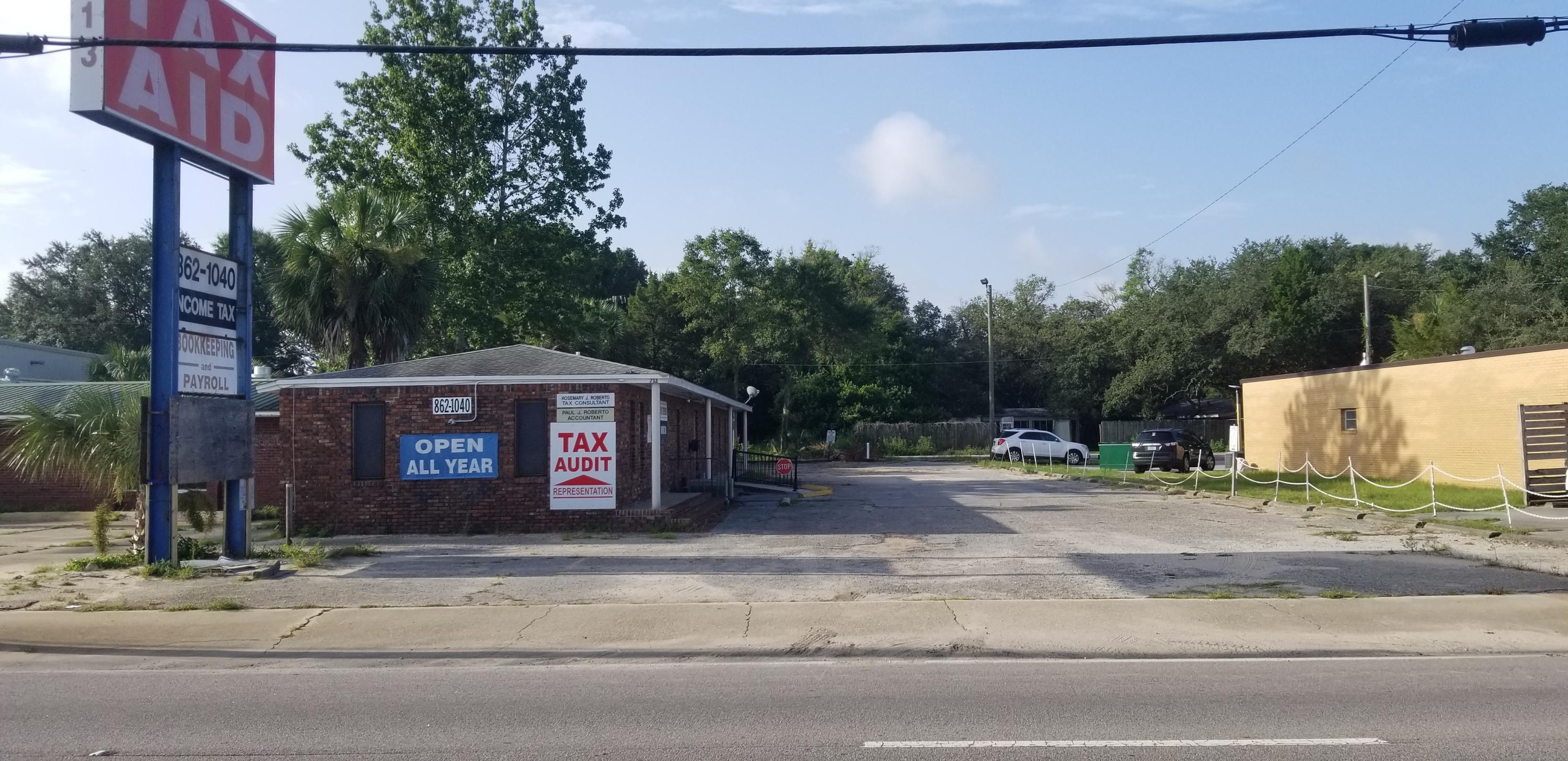 Property has great visibility and within 250 of major stop light intersection at Eglin Pkwy and Racetrack Rd. Front and rear road access. Building could be used for office or retail. Has 2 open large rooms, 2 small offices, 1/2 wall room dividers, and 2 restrooms. 2 AC units and 2 entrance doors. Large metal business sign. Over 49,000 cars per day go by this site. Zoned C-3 Commercial.