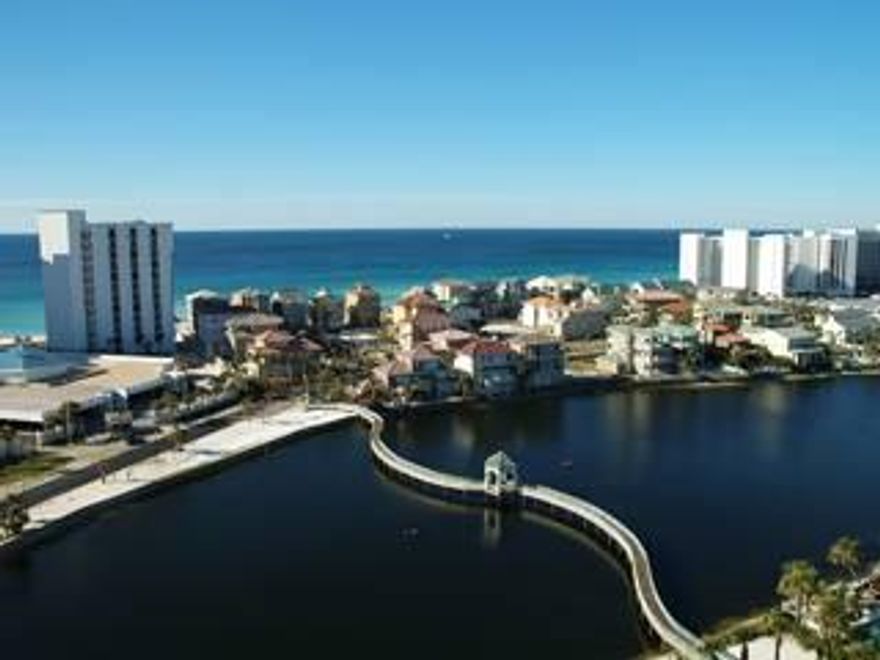 ALL of the best views in Destin from your private balcony! This 2 bd/2 ba condo offers views of the gulf, harbor, east pass, & even a glimpse of Crab Island & Choctawatchee Bay! Condo has been very well maintained; operating as a long term rental in the summer months & Owner occupied during the winter snowbird season. BRAND NEW HVAC system & refrigerator (Feb/Mar 2016), recently updated living room furniture, TVs, washer/dryer, kitchen & bathrooms with new cabinets and granite counter tops. Offered fully furnished & rental ready. The Terrace is part of the gated community of Pelican Beach Resort, where you will enjoy all of the Resort's amenities, including seasonal shuttle service to the beach access, gulf front indoor-outdoor pool, hot tub, tiki bar, game room, steam room, sauna,