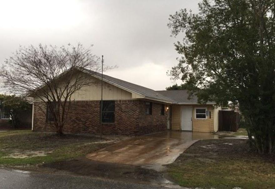 REO ~ Awesome Opportunity in the heart of Destin. This 3 Bd / 2 Ba home is situated on a corner lot & offers two separate living areas with one featuring brick fireplace. Tile flooring is offered in both the living room & kitchen areas. Enjoy entertaining in your fenced back yard with covered porch & open deck. This is a Fannie Mae HomePath property.