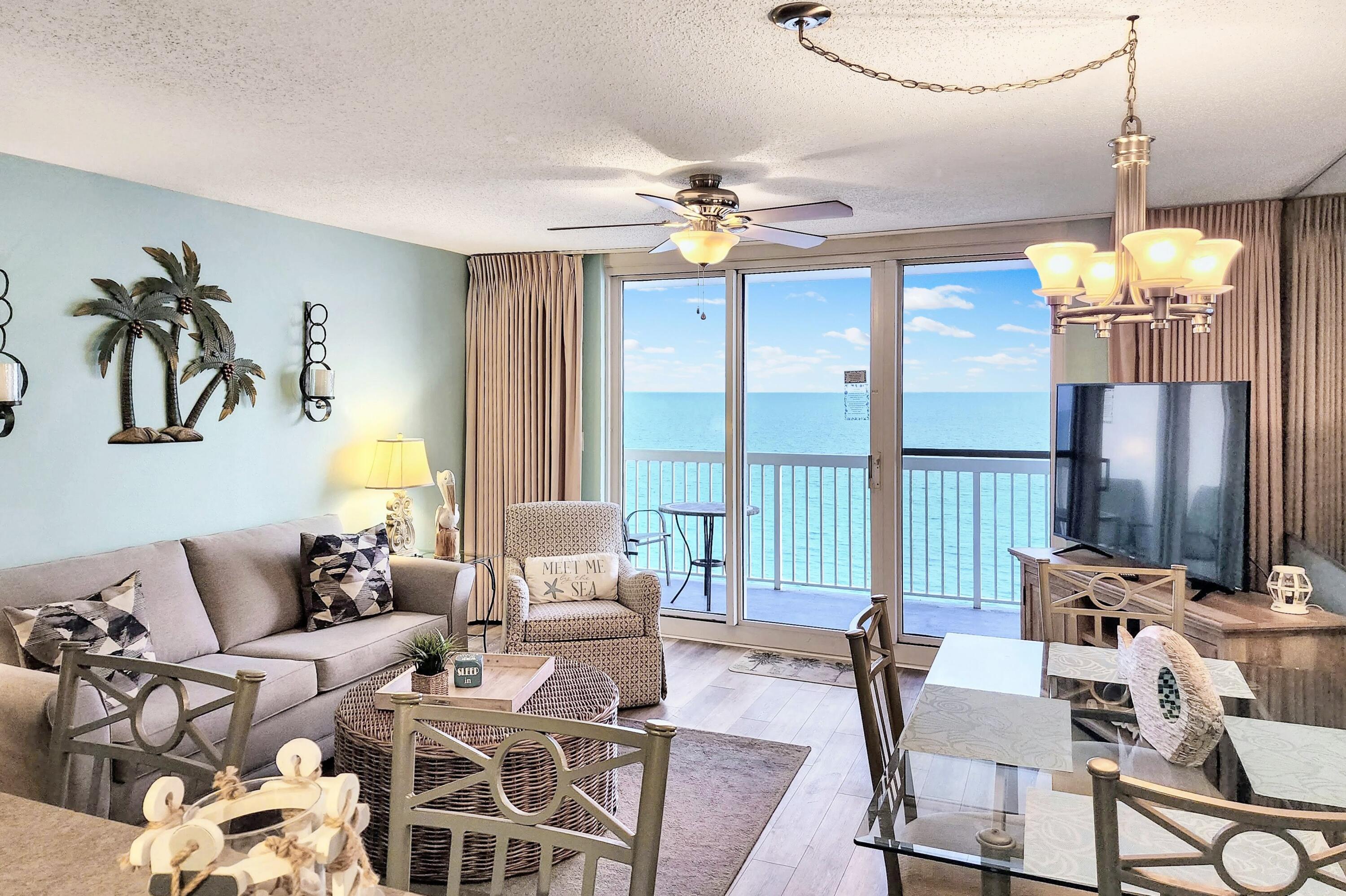 Welcome to a beachfront paradise on the 10th floor of the Pelican Beach Resort; a true gem that beautifully combines comfort, luxury, and awe-inspiring Gulf views. This exquisite unit is a dream come true for beach enthusiasts and astute investors alike. Offered fully furnished and with a strong rental history, it's primed to deliver immediate investment revenue.Comprising one bedroom, hallway bunks, two full bathrooms, and a sleeper sofa, this condo comfortably accommodates up to six guests. The open living area gracefully extends to a private balcony, offering unobstructed vistas of the pristine white sand beach and the captivating emerald waters of the Gulf.