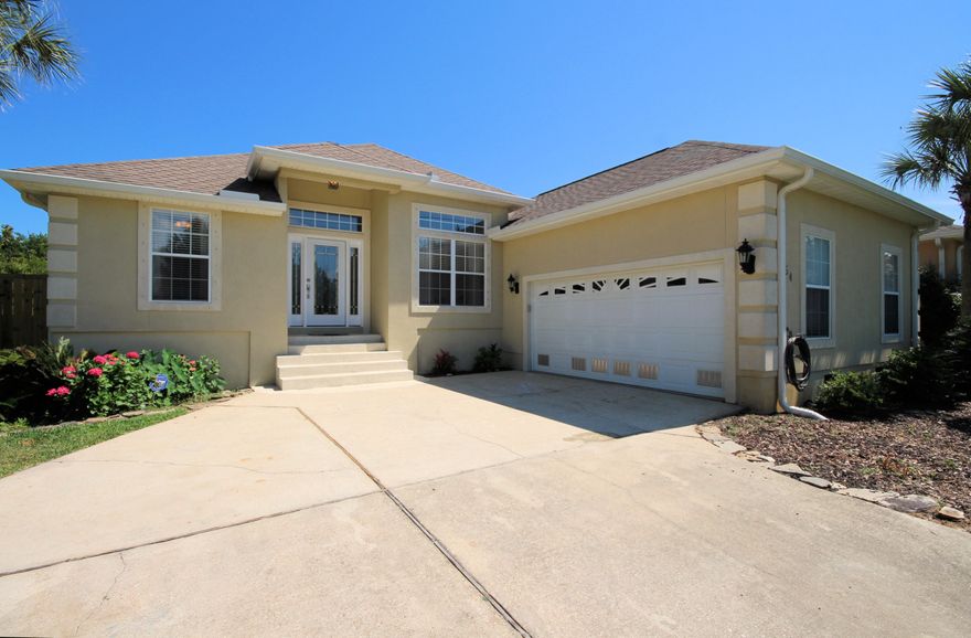 Custom built, stucco home recently updated! You will love this home with 10 ft ceilings, Florida Room, sparkling POOL with waterfall AND private community dock! Step inside the new lead glass front door and you will notice the UPDATED, open floor plan. All new lighting, walls opened, kitchen updated, stainless steel appliances, granite, fireplace and more! The great room, dining area, kitchen and breakfast nook are all open for easy entertaining and everyday living. The large master bedroom and bathroom are a true retreat with a sitting area and double vanities, garden tub and access to the Florida Room. The walk in closet features access to the laundry room for convenience. The backyard will be your hangout space for BBQ's and pool parties! No worries: flood insurance is NOT required