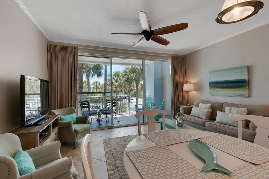 No updating needed. This beautifully decorated unit comes fully furnished and rental ready. Tiled floors, beautiful blues, greens, and yellows throughout. White appliances. Very beachy and fun! Building has been recently painted and looks great! Directly across the street from beach access and overlooks the pool. Gulf Place is a vacation destination with plenty of things to do. Three pools, hot tubs, shuffleboard court, walking trails, dog park. Walk to dinner, breakfast and lunch, shopping and entertainment. Close to the Santa Rosa Golf Course too. Perfect location. One Year Home Warranty being offer with purchase.