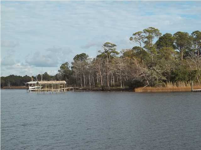 Great Price! ***NOT A SHORT-SALE.*** Peaceful waterfront homesite on Lagrange Bayou. Picturesque views of the bayou, native oaks, magnolias and hardwoods with deep water access from this ideal home site. With approximately 260 ft. on the natural harbor of historic Lagrange Bayou you will enjoy access to the abundance of Choctawhachee Bay and the Intercoastal Waterway. Bayou Bend Subdivision is a 15 lots subdivision with protective Covenants and deed restricted to single family homes. With a short ride to the award winning beaches of 30-A you can have it all!....Buyer to verify all data.