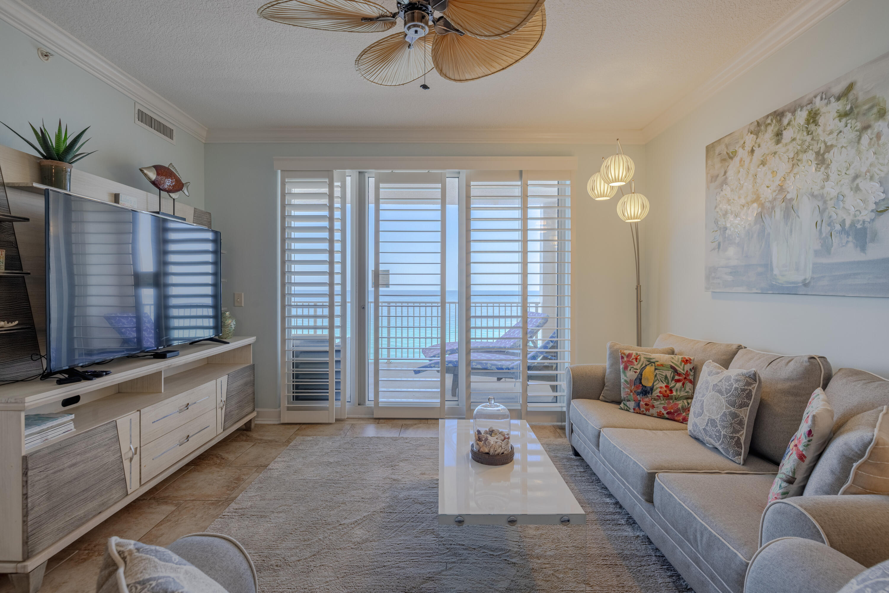 Experience the tranquil, laid-back lifestyle of coastal living in this inviting Ocean Reef condo. Sold fully furnished and rental-ready , this 2-bedroom, 2-bathroom unit is the perfect investment--whether you're enjoying it with family and friends or renting it out as a vacation getaway. Both the living room and primary bedroom open to a spacious Gulf-front balcony, where you'll be captivated by endless views of the sparkling emerald-green waters. This balcony will quickly become your favorite spot, whether you're savoring your morning coffee or unwinding in the evening with your favorite drink watching a spectacular sunset. On special days, you may even catch a glimpse of dolphins playing in the surf or rays gliding gracefully by, creating unforgettable memories. This unit has some specia some special touches such as plantation shutters on the sliding glass doors in the living room and master bedroom. It is pleasantly decorated. New applicances were recently added in the kitchen. This one is ready to enjoy. Ocean Reef offers fantastic amenities, including an outdoor pool overlooking the beach, hot tub, an indoor heated pool, a fitness center, and a sauna. Centrally located in the heart of Panama City Beach, it's just a short walk to popular local favorites like Runaway Island Restaurant, Amore Donuts, and Fun Land, along with many other great dining and entertainment options nearby. Don't miss this incredible opportunity to own a piece of paradise!