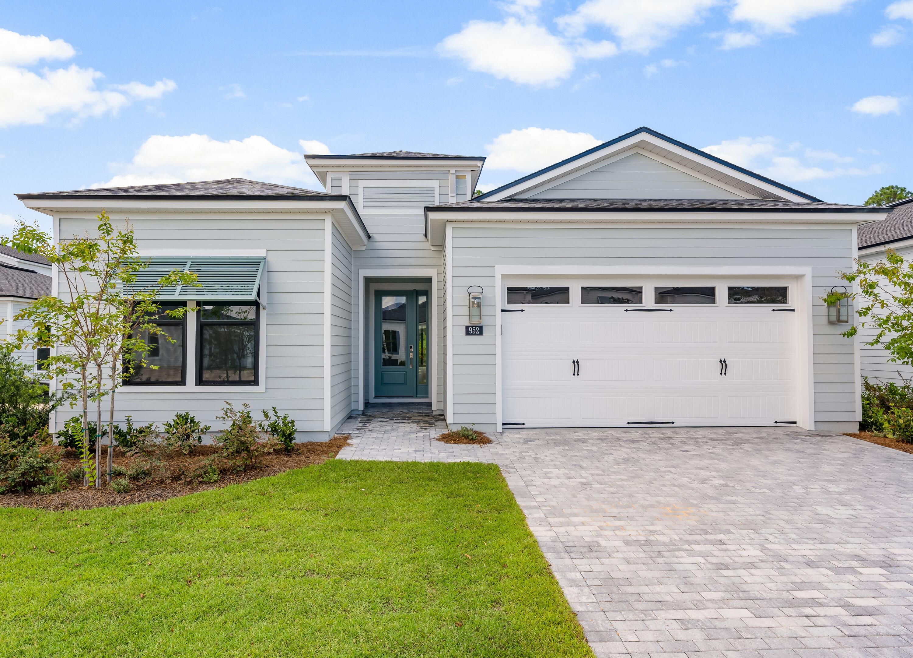 Single-story new home located on a private preserve home site. Available quick move-in. 4-bedroom, 3-bathroom residence boasts an inviting office/study room with glass doors, working from home, arts and crafts or play room. As you enter the home, you are greeted by a grand foyer with soaring 12-foot ceilings, setting the tone for the open and airy feel that flows throughout the entire space. The remainder of the home features 10-foot ceilings, adding to the sense of spaciousness and elegance. Luxury vinyl plank flooring throughout the home and tile in bathrooms. The open gourmet kitchen is outfitted with stainless steel appliances, sleek quartz countertops, designer tile backsplash, pendant lights, spacious pantry and ample cabinet space for all your culinary needs. Whether preparing a family meal or entertaining guests, this gourmet kitchen is sure to impress. The primary suite is a true retreat, featuring a luxurious en-suite bath complete with a separate tile shower and a large soaking tub perfect for unwinding after a long day. With an upgraded multi-slide stacked door in the great room that opens up fully for indoor and outdoor living to a covered patio with pavers. Explore everything this exceptional home has to offer and schedule your appointment today. Construction is complete available for quick move-in.