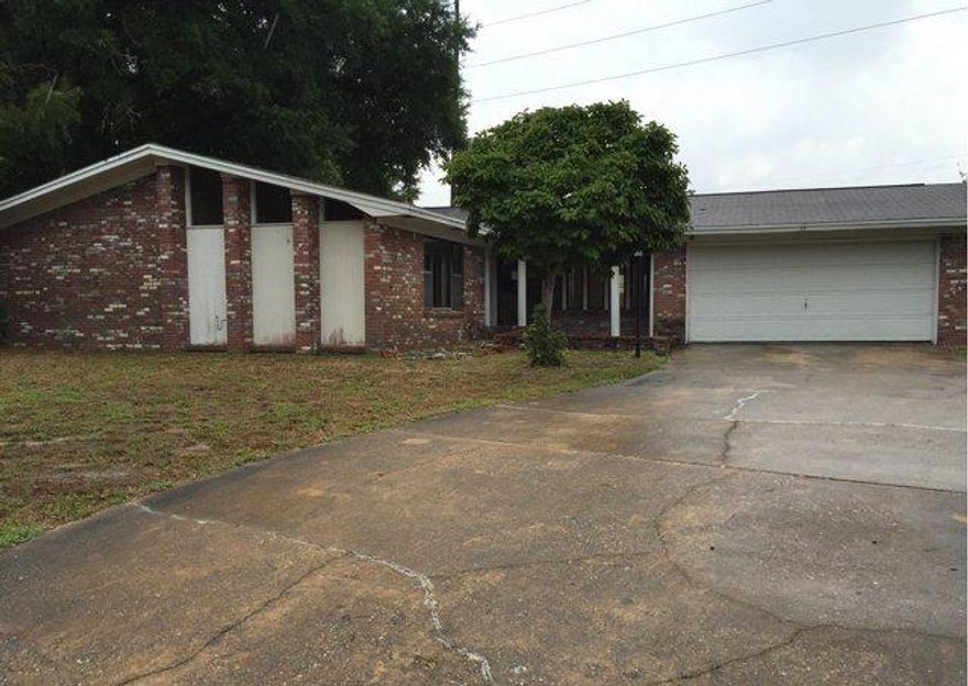 REO ~ Spacious all brick home offers lots of potential... Situated on a cul-de-sac, the 3 Bd / 2 Ba home offers tile floors through out the living room, dining room & kitchen. The living room also features a brick fireplace. Large fenced back yard. Don't miss out on all this home has to offer. Property was built prior to 1978 and lead based paint potentially exists. Prior to seller receipt & approval of the full title package from foreclosure, title to the Property will be conveyed by a quit claim deed.