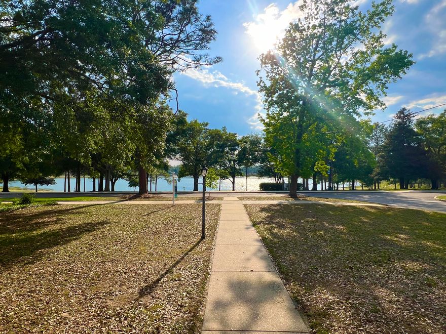 Treasured Circle Drive offers a choice opportunity for those who know that location is king. This 1967 brick 3 bed/2 bath home has those proverbial good bones and is a prime opportunity to renovate and make it your own. Add a second story, paint the brick, open up the screened porch - the opportunities are endless on this corner lot with spectacular, high value west facing views. Hardwood floors. Single car garage. Situated between 2 of the largest, finest homes on Circle Drive. If you've been dreaming of a home in the historic district of DeFuniak Springs, and walking distance to downtown, do not wait to snap up this rare opportunity that won't wait for the indecisive.