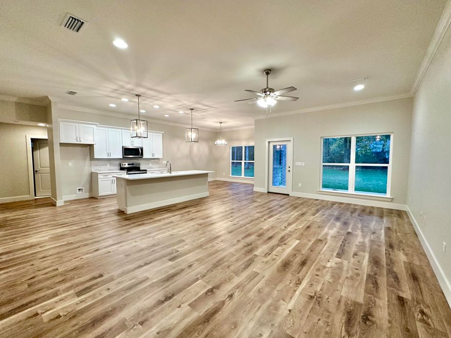 Pro photos coming soon, Brand New Construction! Award Winning Builder! NO HOA! LARGE FLAT LOT! This all brick QUALITY built home is available now and ready to impress. The added touches , trim work, and quality finishes let you know right away this isn't a mass produced cookie cutter home. The open concept floor plan has a great flow and really maximizes space. There is no carpet in the home, LVP flooring and tile throughout.The kitchen features an island with farmhouse sink, cabinet bases with soft close full extension drawer bases and beautiful wood cabinetry. Some of the Upgraded features include cabinetry in laundry room, board and batten wall trim in the master bedroom and entryway, upgraded lighting and recessed lighting throughout, maniblock water isolation system, irrigation syste