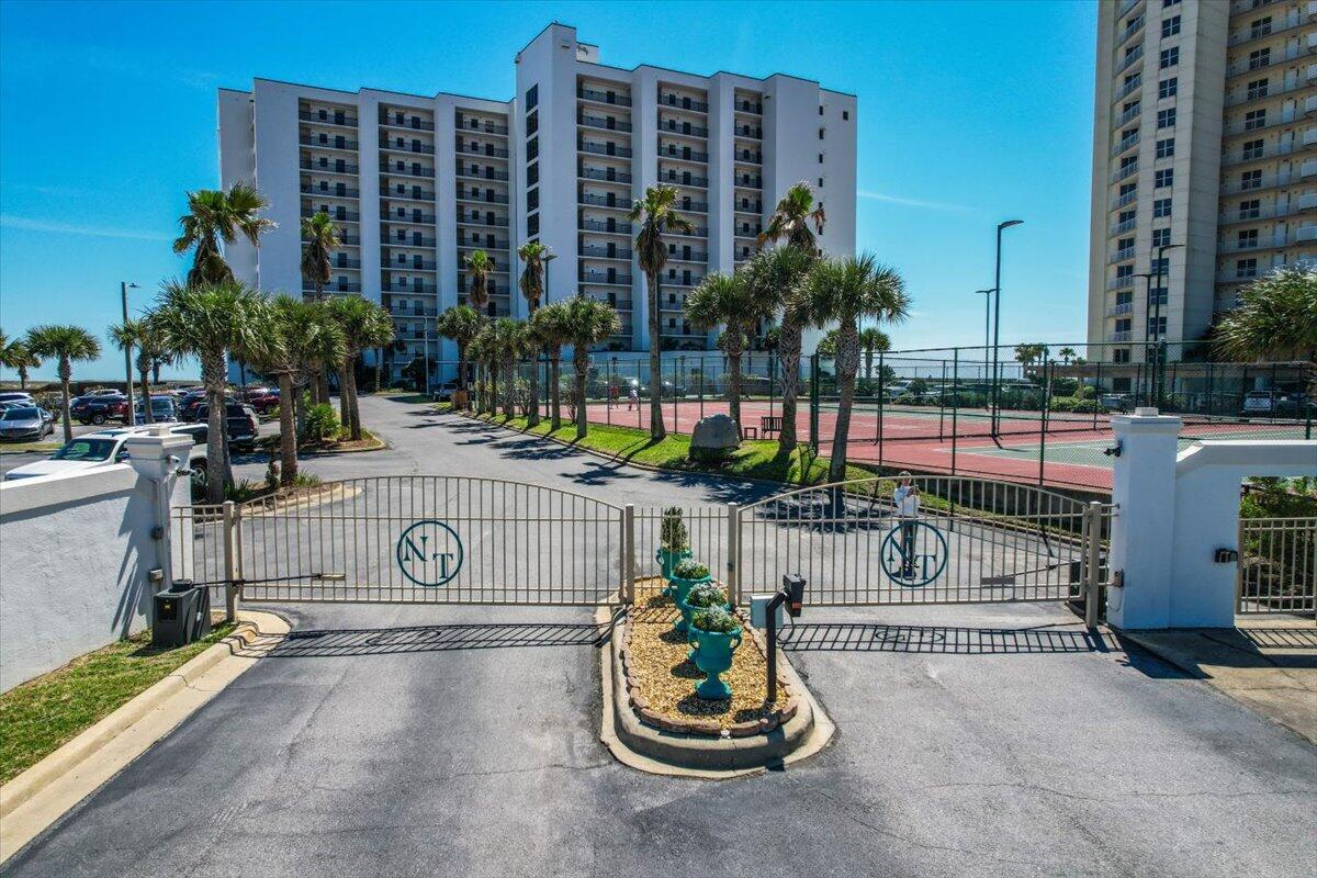 Stunning Gulf-Front Condo at Navarre Towers - Selling Fully Furnished, Impeccably Maintained!Welcome to Navarre Towers 803, a beautifully maintained 2-bedroom, 2-bathroom condo offering 1,360 square feet of coastal luxury. Nestled along the pristine shores of Navarre Beach, this unit has never been rented, ensuring it remains in top condition. Whether you're searching for a serene beachfront retreat or a high-performing investment property, this condo delivers--rental projections range from $60K-$70K annually! Step inside to find porcelain tile flooring, custom Maple cabinetry in the kitchen and baths, and granite and marble countertops. The kitchen is well-appointed with undermount sinks, a 3-way under-cabinet lighting system, and quality appliances. The spacious primary suite boasts an upgraded bath with a comfort-height toilet and custom cabinetry, while the guest bath mirrors the same level of detail.

Notable upgrades include:
 HVAC system (2015) with NEST thermostat
 Water heater (2015)
 New washer & dryer (2025)
 All ceiling fans replaced (2024)
 Fresh paint updates (2024)
 High-end, 7" base molding throughout

Navarre Towers is a gated, Gulf-front community offering private beach access, a fitness center, tennis & basketball courts, and a heated pool. Additionally, all milestone inspections are complete, with reports available upon request, along with the seller's disclosure and condo documents.

Don't miss this rare opportunity to own a well-cared-for beachfront condo with strong rental potential and long-term value. Schedule your private showing today!