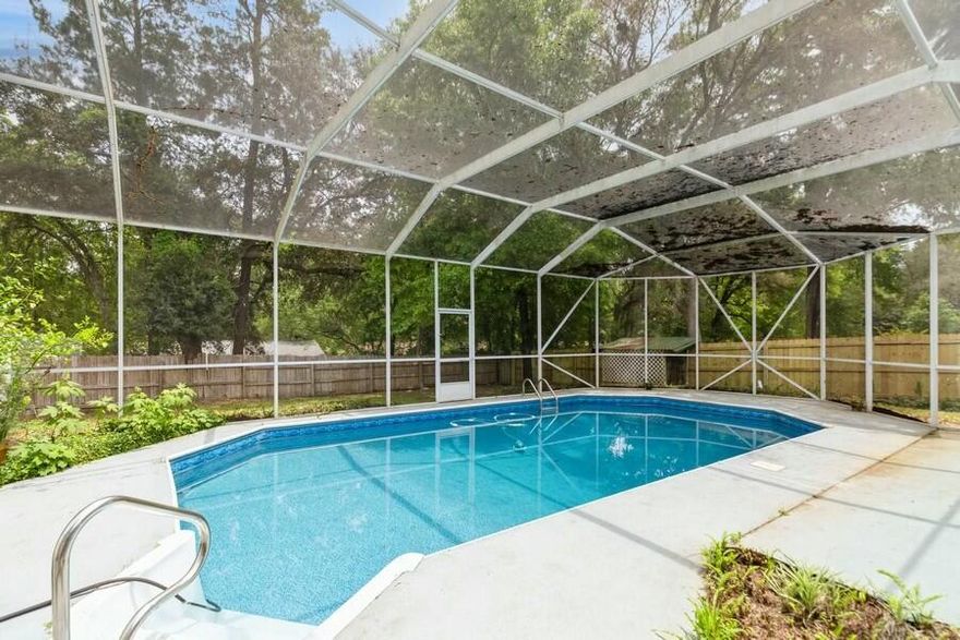 Offering $4,000 towards buyer's closing cost. Spacious and inviting, this 3-bedroom, 2-bath home offers nearly 2,300 square feet of living space in the heart of Niceville. The open-concept kitchen has been remodeled with maple cabinets and quartz counters. Outside is a covered porch overlooking a stunning 16x32-foot screened in swimming pool. The primary suite offers direct access to a private deck with a hot tub. Additional highlights include a generous den/flex room with a bar and an attached two-car garage. Ideally located near top-rated schools, shopping and Eglin AFB, this home offers both comfort and convenience. This home has a brand-new roof, 2020 HWH, 2017 HVAC, and also has solar panels that will save on electricity. Solar panels will be paid off by seller.