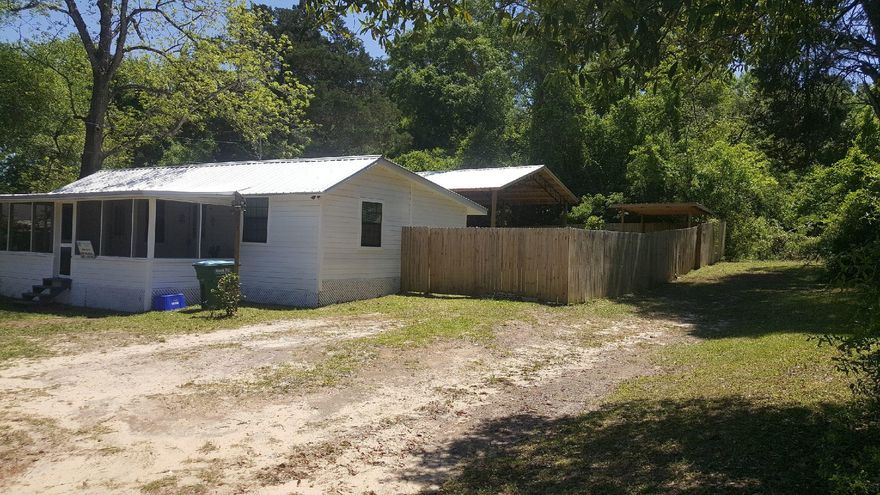 Conveniently located 1 mile north of I-10 in the central part of Crestview East Side of Ferdon Boulevard tucked away in a well-established neighborhood. Only 30 minutes away from Destin beaches.Completely remodeled home. Privacy fenced yard. Features pole barn. Home also includes covered front porch. Ash hardwood flooring, 3/4' thick. All new plumbing. New upgraded 200 Amp service sufficient to add electrical service to Pole Barn and out buildings.