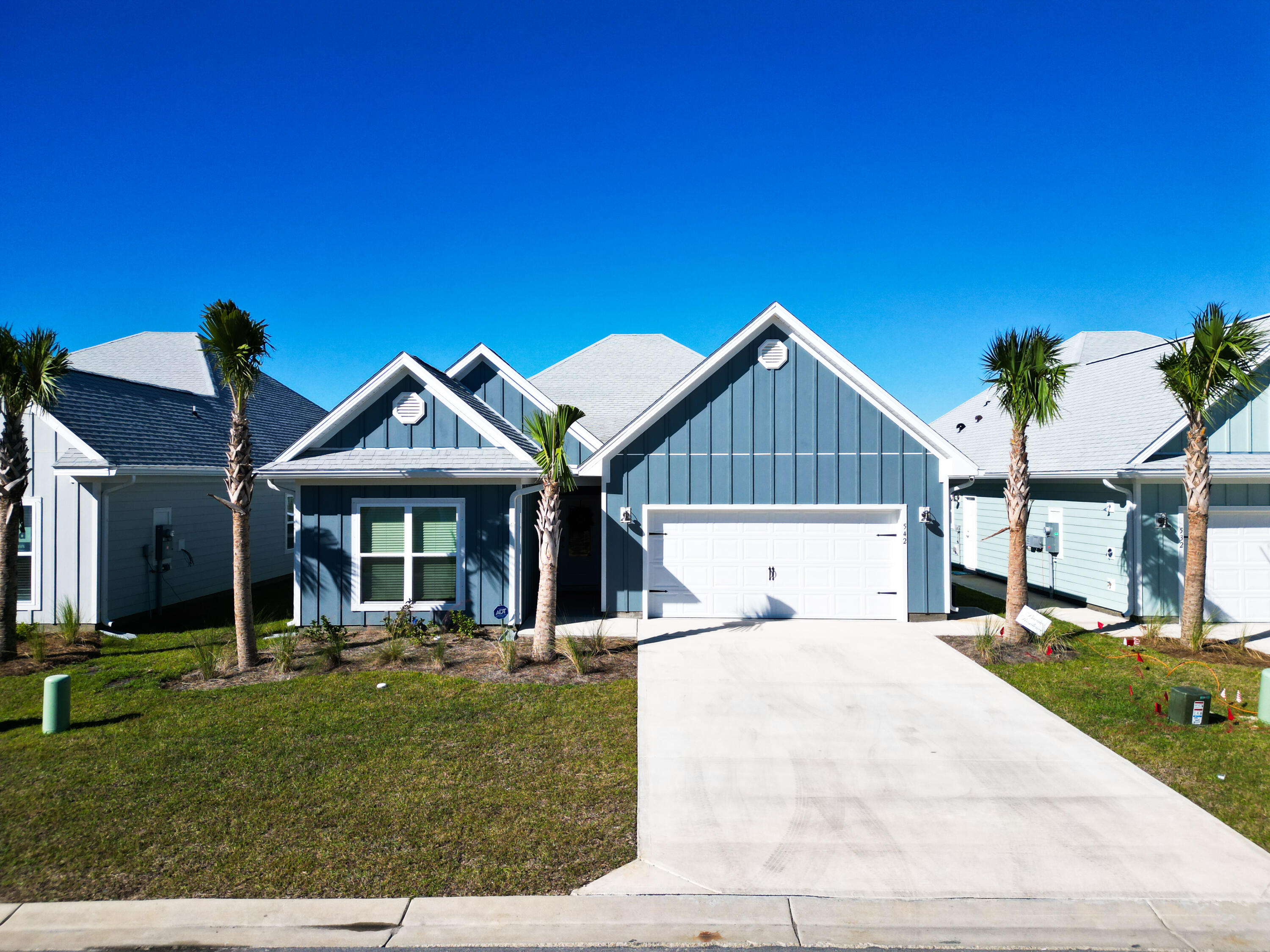 Newly constructed and turn key/ move in ready. This 5 bedroom 3 bath 2129 square foot home with a spacious garage checks all the boxes for beachside living. Located in the Windmark Beach North Phase II subdivision with access to the beach and all of the amenities at town center. Only 5 minutes between the popular and coastal destinations of Port St Joe and Mexico Beach one will be close to all of the area's attractions. Open and spacious floor plan that is great for relaxing or entertaining while enjoying the laid back coastal lifestyle on Florida's Forgotten Coast. Home has a well appointed kitchen with walk-in pantry, island, stainless steel appliances, and granite counter tops. There is also a separate dining nook with seating for eight. The great room has a sectional and entertainment center that opens up to a furnished and covered back porch. The master bedroom has a king bed and an en suite with double granite top vanity as well as a separate shower and garden tub. 3 other bedrooms and 2 baths round out the layout as well as a bunk room. This space will easily accommodate 12 persons. Don't miss this opportunity to to purchase this coastal gem at a great price. Some dimensions and information were obtained from the Gulf County Property Appraiser's website. Please verify if important.