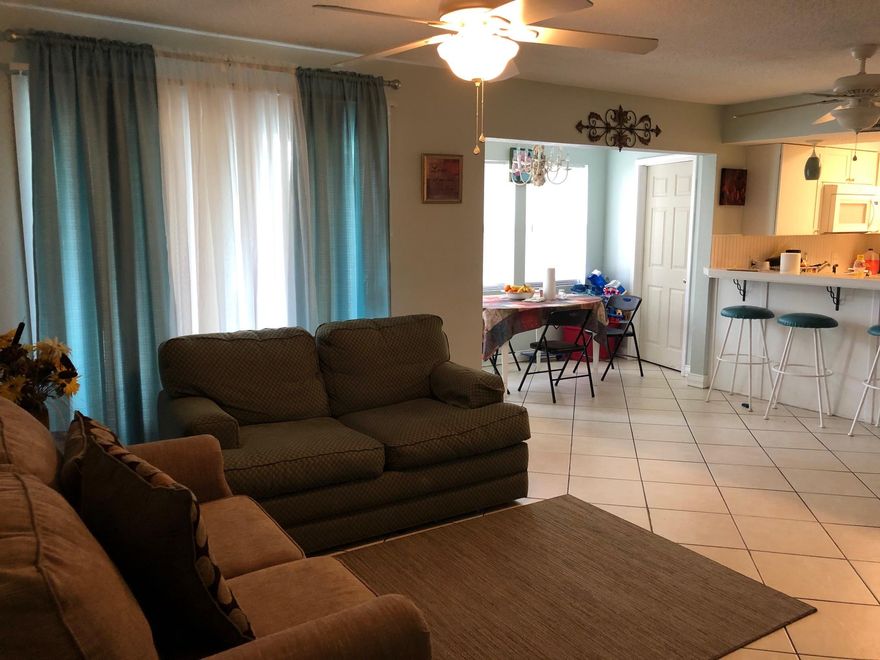 Affordable 2 Bedroom, 2 Bath Condo in the Heart of Destin. with a view of the Lake. Many updates. Updated flooring, Updated kitchen, Updated bathrooms, New A/C 2018. Washer/Dryer hook up. Great rental unit, vacation or long term. Centrally located. Close to the Beach, Restaurants, Shopping & Entertainment. Amenities include: 3 pools, tennis court, outdoor grills, community room. Buyer to verify all dimensions. Must Honor rental & Ma. agreement.