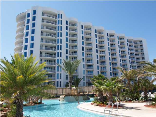 This property is under contract with a 72 hour first right of refusal. The Palms offers so many wonderful amenities, this is a great place for all seasons. Fabulous 11,000 sf lagoon pool with water falls and bridges along with shallow pool and splash area. This is one of the larger two bedroom units and is located on the 9th level with two balconies facing the sunset and perfect for watching the airplanes. You also get really good views of the gulf and towards the Destin Harbor. This unit is rental ready with granite in kitchen with black appliances, laundry and two great baths. You'll love the convenience in access to everything with one of Destin's newest complexes.