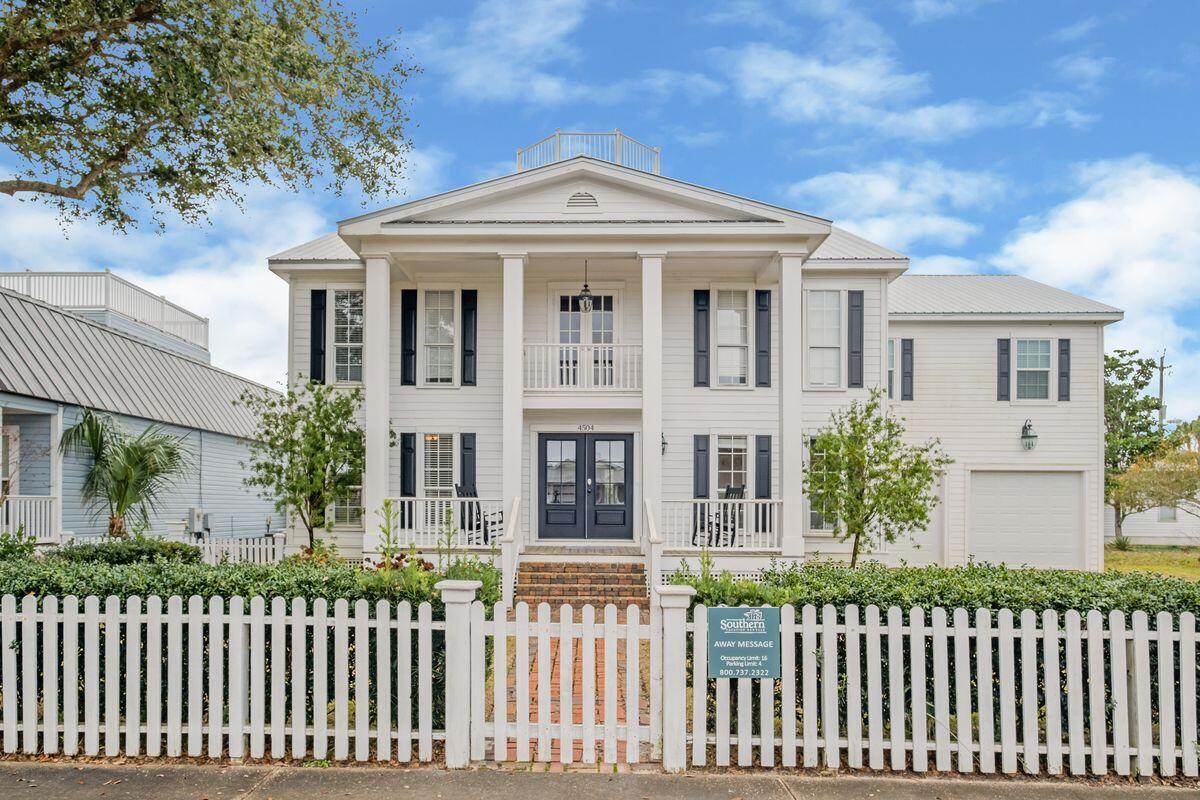 Located a short walk or golf cart ride from world-famous Crystal Beach, this is a home for those who like the luxury of extra space and a comfortable Florida lifestyle centered on the generous private pool. This spacious three-story home oozes character with an imposing plantation-style facade behind a white picket fence. To the side, a driveway leads to a two-car garage with ample storage for bikes and beach toys. Newly renovated, the interior of the home has noteworthy hardwood flooring, multiple living rooms and is tastefully furnished throughout.