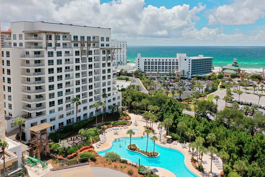 Coastal living & investment potential at Luau Tower II in Sandestin Golf & Beach Resort. Enjoy the best of the beach and the benefits of ownership with this updated 2-bedroom, 2-bath lock-off condominium. With partial Gulf views and vibrant sunset backdrops, this property offers a flexible layout that can be used as a full 2 bedroom home or divided into a 1 bedroom and studio, allowing for a range of living or rental possibilities. Inside, the residence features custom cabinetry, a beverage bar, stainless steel appliances, new countertops, and updated baths. The private balcony provides space to relax, take in the breeze, and enjoy the open views. Offered fully furnished and ready for occupancy or rental use, it's a turnkey opportunity for both enjoyment and investment. Luau's lagoon-style pool with grotto waterfall is a centerpiece, complemented by a hot tub, fitness center, outdoor grilling area, and covered parking. Seasonal amenities include a tiki bar and a children's pool, with shaded seating areas throughout the property.

Located within the 2,400-acre gated Sandestin Golf & Beach Resort, residents and guests have access to accessible beach paths, four golf courses, tennis courts, a full-service marina, shopping, dining, and entertainment at The Village of Baytowne Wharf, plus miles of walking and biking trails. The Beach House restaurant is conveniently located across the street. With its combination of location, resort amenities, and adaptable design, this Luau Tower II condominium is well suited for personal enjoyment, short-term rental income, or a balance of both.
