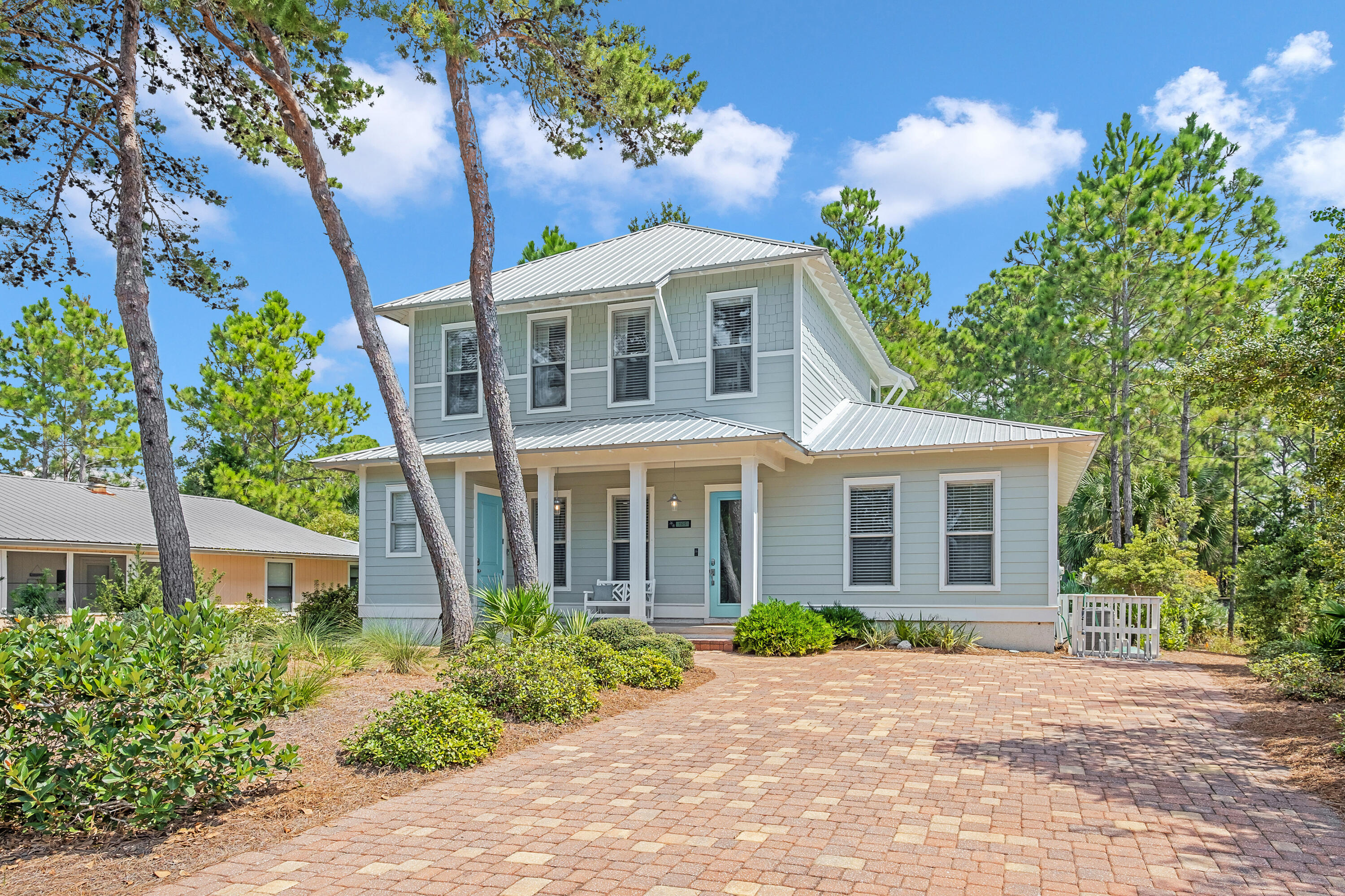 183 Lakewood Drive offers the perfect balance of affordability and luxury with the added bonus of location. Positioned South of 30A for easy beach access, this home would be ideal for everyday living, a second home, or an investment property with the added bonus of having community pool access right out of your back door. The sellers have done a beautiful job updating the home with furnishings and decor to provide a turn key beach retreat to the next owner. The first floor offers an open concept living, kitchen, and dining space with easy access to first floor laundry as well as a generously sized first floor owners suite.