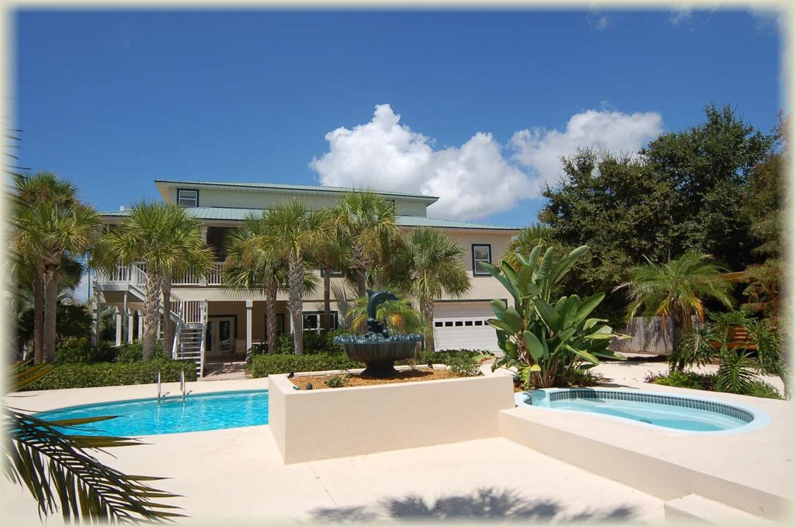 $200,000 ANNUAL GROSS RENTAL INCOME! INCREDIBLE OPPORTUNITY AT THIS PRICE! JUST REDUCED! BRING OFFER! Huge compound on South side of 30A, situated on two large lots with over 6600 sq ft of living space and another 2,500 square feet of covered porches. Incredible opportunity to own your own gated compound! Gulf Views! This home can accommodate 27 guests and is only steps from the public beach access. Adjacent 3rd lot is also currently for sale which is currently part of this compound. The home includes 2 fireplaces, two 2 car garages, 10' ceilings!