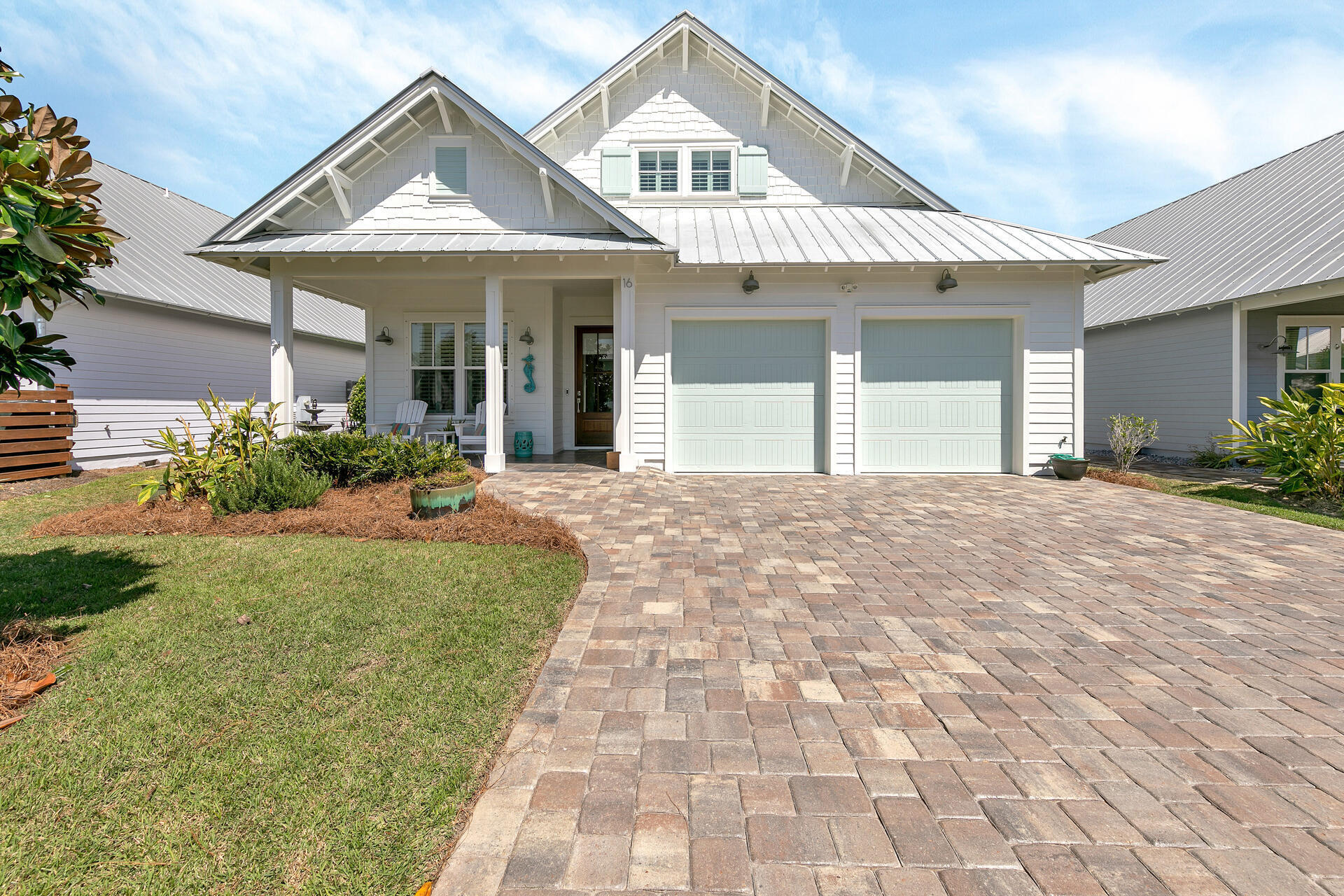 Picture yourself living near the beach, restaurants and shopping in this beautiful home with NO HOA fee.  Located less than 1/2 mile to the beach this home is truly made for the beach lifestyle.  Beautiful Heart Pine floors welcome you throughout the main living area with carpet in the bedrooms.  The open, split bedroom floor plan is a favorite of many buyers with lots of room for entertaining.  Wood cottage cased windows and 2-piece crown molding accent the high ceilings.  Main living, master and two additional bedrooms located on the main floor with a versatile bonus 4th bedroom/office/playroom/you name it located upstairs.  This room is plumbed a future bathroom.  Kitchen features stainless appliances and gas range.  Master bedroom, located in the rear of the house features two walk-in