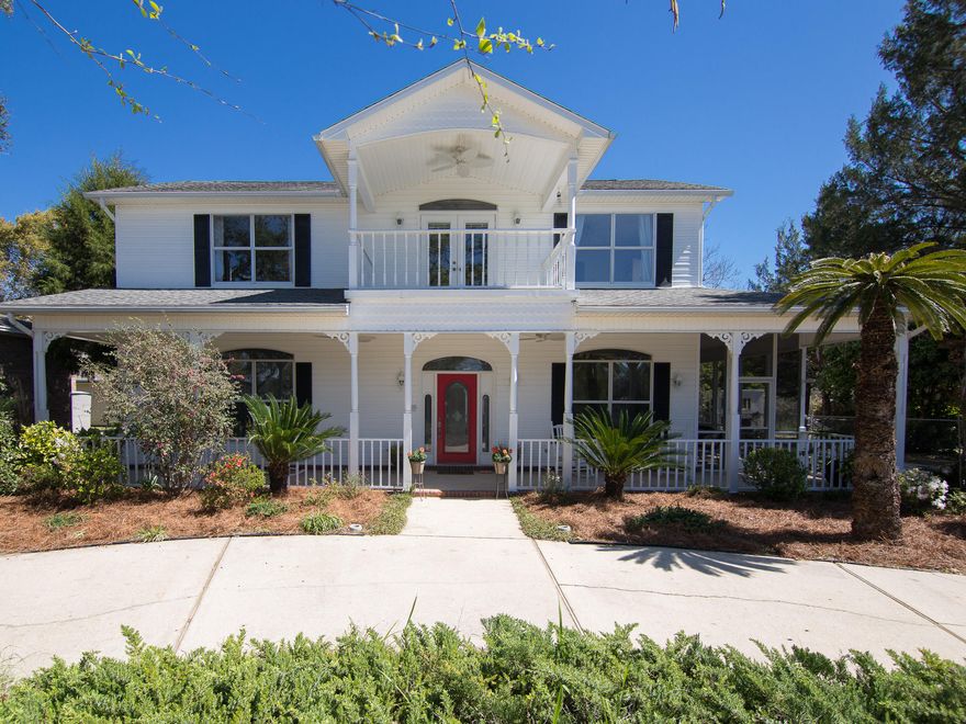 Bayou views GALORE from this lovely two story home! Have your morning coffee and watch the dolphins play from the balcony or take in an amazing sunset from your expansive front porch or screened-in side porch. This home maximizes the water views in the front and brings nature inside with the windows and doors across the back. Upon entering the home you are greeted with a grand entryway, a lovely dining room on your right and sweeping cathedral ceilings in the living room. The spacious kitchen has an abundance of cabinets and a water view to enjoy from your window above the sink. There is a breakfast nook that overlooks the screened porch. Upstairs you have a large loft that makes a perfect office with built-in bookshelves and more breathtaking views. Both bedrooms upstairs have a bayou view and an attached bath. One being a second master with double sinks. There is a playroom upstairs as well. Back downstairs, you have another room off of the kitchen that could serve as a home gym or second office. The circle drive and long driveway allow for plenty of parking for all of your friends and family and you have the space to entertain indoor and outdoor. Enjoy all that nature has to offer on your back patio. The backyard is home to so many birds with all of the flowering plants and trees. There is a gas hook up on the patio so perfect for grilling or an outdoor fireplace! Don't miss the bonus room above the garage. It is currently being used for storage, but could make a great hobby room, workout space or game room.  The stairwell is inside the garage and this space is not included in the square footage. Come see all this home has to over. Refrigerator conveys as-is. Owner does not use the central vac system or speaker system so those convey as-is also. All Room measurements are approximate and should be verified.