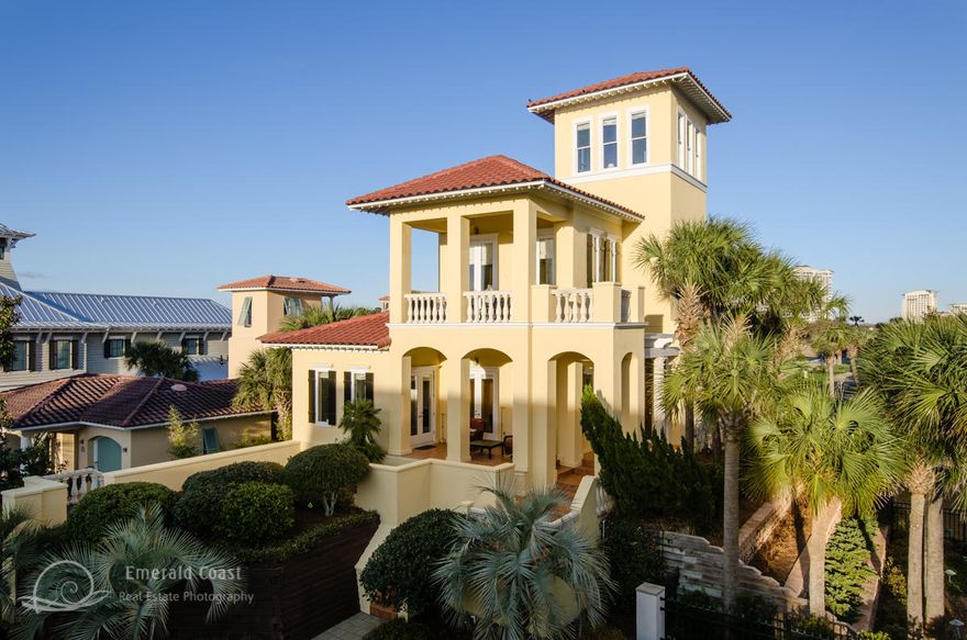 New price is $100,000 under recent appraisal(please see appraisal under documents! Gorgeous Mediterranean Castle 60 steps from the beach with own private beach access from fenced in back yard. Breathtaking views of the Gulf from 2500 sq. ft. of lavishly furnished terra cotta tile patios. Florida sunsets are a special delight over the Gulf, while watching the crashing waves. Exotic granite, stainless steel appliances, new shaved ice machine-all part of your kitchen. 12' Imported mahogany Italian front door, granite floors, marble floors, and hardwoods throughout, 15' ceilings on three floors- Elegance every step! Extra guest house- self contained!