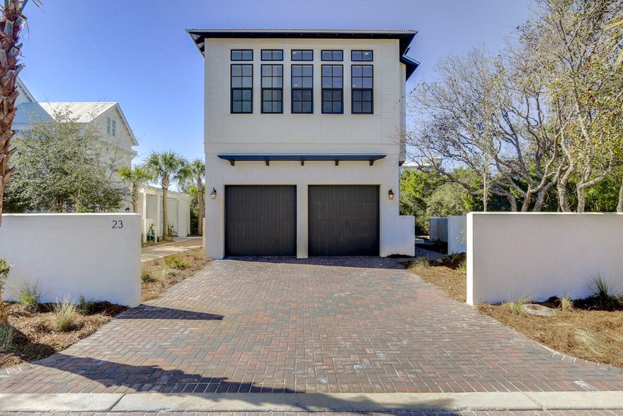 Beautifully designed and quality constructed, new Florida Cottage in the exclusive gated community of SeaNest Village. This majestic home was built by the highly sought out, marquis builders - Cogent Building Group. They are known for their commitment to excellence and their accomplishments in the home building industry have earned them awards and distinguished recognition in custom home construction, commercial buildings and land development. This high end luxury home offers 3 floors of superb and well-designed living space to accommodate lots of family and friends. The 1st floor consists of a 2 car garage, a roomy foyer, 2 bedrooms, a Jack - n � Jill bathroom and a laundry room. Features include raised ceilings, hardwood floors, Carrara Marble countertops and tile floors in th