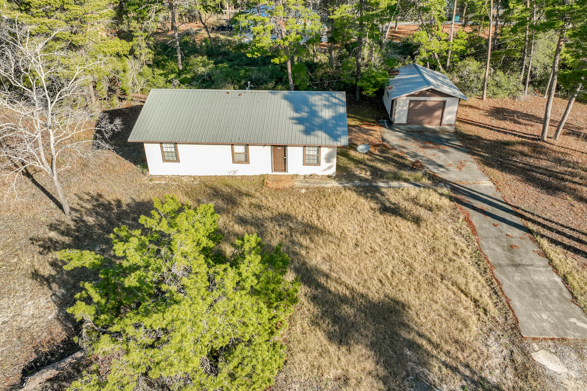 Prime Large Corner Lot (.40 of Acre) with small cabin in Inlet Beach, NO HOA, No Build out timeframes, partially cleared, enjoy the old cabin on the property or build your dream home in a great location. The value is in the land however the cabin is very much livable needs some TLC or choose to build new.