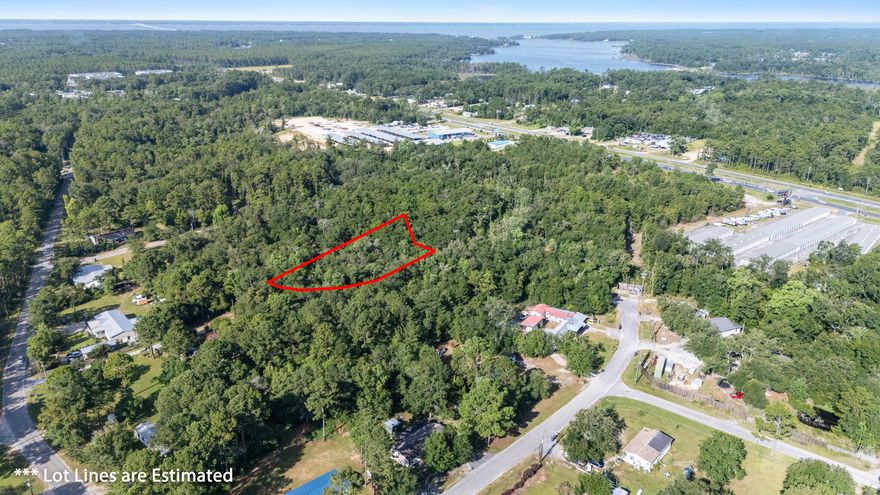 Tucked away beneath a canopy of mature trees, this serene property offers the perfect blend of natural beauty and coastal convenience. A gentle creek traces the edge of the lot, creating a peaceful backdrop for your dream home or weekend retreat.

Just minutes from Choctawhatchee Bay, your days can begin with a sunrise paddle and end with a fresh catch. Launch your boat just down the road at Grady Brown Park, complete with picnic areas, a playground, and a sandy shoreline. From there, the waterways open up to local gems like Four Mile Creek, Black Creek, and Hogtown Bayouan angler's paradise and explorer's dream.

Want beach days on the calendar? This property places you 25-30 minutes from the sparkling shores of the Emerald Coast, and you're ideally situated for an easy drive to both Destin and Panama City Beach.

1 acre of uplands - ready for your vision

City water available; septic needed

Mobile homes welcome. RVs not permitted per city ordinance

A rare blend of quiet nature and coastal living, this lot is more than landit's a lifestyle waiting to be lived.

