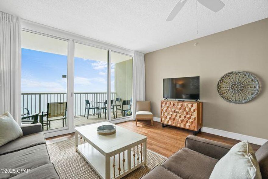 The beach getaway you have always dreamed of - a beach inspired 2BD/2BA Gulf front condo at Majestic Beach Towers. Gorgeous Riveting Gulf views are framed by beachy chic interiors, designed with the Gulf of Mexico and sun in mind. Sunshine and warm gulf breezes abound from the generous balcony, with amazing water and beach views. This fresh, ultra clean, meticulously maintained, turnkey offering has all of the extras and will convey fully furnished, decorated, and rental ready. Fantastic rental history ($78,159 in 2024) and CTO listed in documents section of the MLS listing - contact listing agent for detailed rental report. Luxury vinyl plank throughout.