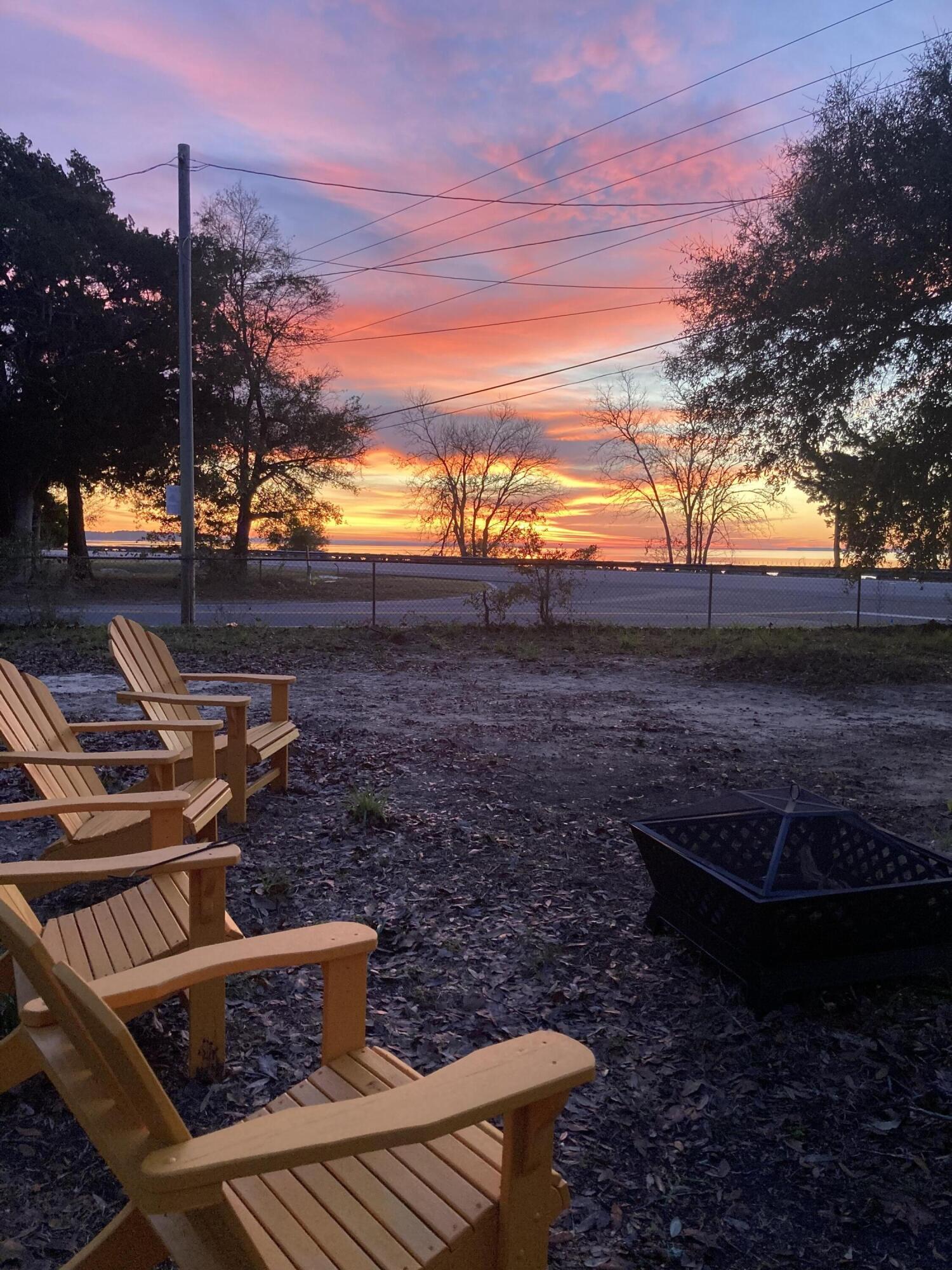 Welcome to your cozy retreat right across from the Choctawhatchee Bay. This charming 3-bedroom, 1-bath cottage offers modern comforts, a fenced-in yard, family-friendly amenities, and a pet-friendly stay. Relax by the fire pit, enjoy stunning sunsets and sunrises, and reach the beach in just 15 minutes. Bring your boat; there is plenty of room to park it, and there is a boat launch less than a mile to your east.