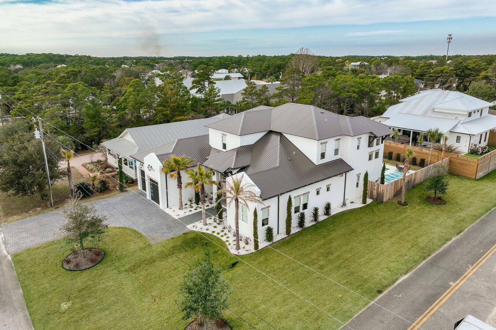 INVESTMENT PROPERTY OPPORTUNITY!! This exquisite TURNKEY home a short stroll to the beach is in the 30A Community of Blue Mountain. From the moment you step inside this beauty, you'll never want to leave. Your eyes will be drawn to the wall of glass doors that open to the outside pool, spa, and entertainment space. Inside is equally amazing with tall ceilings in the living, dining, and kitchen areas giving new meaning to open concept. The kitchen is a chef's dream with an 8-burner gas stove, double ovens, and 2 refrigerators. There is seating at the kitchen island for 6 plus a dining table that seats 8 and an additional bar top area for 3. This is the perfect place for corporate retreats, reunions, multi-family gatherings and much more with room to sleep 20. *Golf cart included* This home has 6 bedrooms and 8 bathrooms with plenty of space to entertain and relax. This is also a perfect home for the boaters looking to explore great fishing both in Choctawhatchee Bay or head offshore in the Gulf of Mexico.

ABOUT THE AREA:  Blue Mountain is one of the 30A coastal communities that rests between Gulf Place and Grayton Beach. The Blue Mountain community is known for having a quieter family atmosphere compared to some of the other communities but still provides ample restaurants, shops, and activities. 

BEACH ACCESS: Gulfview Heights is the closest beach access(approximately 1800ft from the house). It has parking, restrooms, showers, picnic tables with shelter, and lifeguards during peak season. From the house, turn right on 30A and left at Goatfeathers Seafood restaurant at Gulfview Heights street, then 1/4 mile to the gulf.

ACCOMMODATIONS:
Bedroom 1 - King room, Ensuite bathroom - 1st Floor
Bedroom 2 - King room, Ensuite bathroom - 1st Floor
Bedroom 3 - King room, Ensuite bathroom - 2nd Floor
Bedroom 4 - King room, Ensuite bathroom - 2nd Floor
Bedroom 5 - Bunk Room, Ensuite bathroom Twin/Twin - 2nd Floor
Bedroom 6 - Queen beds, Ensuite bathroom, Bunk area Twin/Twin - 2nd Floor