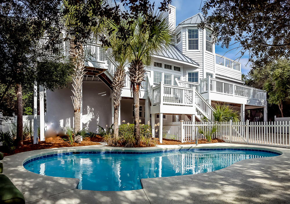 NEWLY RENOVATED 7 bedroom, 6 bath beach home located on the SOUTH SIDE OF 30A w Camp Creek Lake access. New stylish, modern detailing. Just ONE BACK FROM THE BEACH w GULF VIEWS & PRIVATE HEATED POOL. This home offers 3 separate living spaces. Huge great room boasts 2 1/2 story soaring ceilings w architectural details. Off large living area is dining room & breakfast area w plenty of seating for any sized group. Modern kitchen offers ample counter space for a party of chefs. 30 cu.ft. refrigerator plus second fridge off laundry room. Home has makings for HIGH CALIBER VACATION RENTAL. Spread out & sunbathe on 3 decks, 2 porches or at private pool. Located just 35 YARDS FROM THE GULF with easy beach access via the beach staircase located at the end of home's driveway. A MUST SEE NOW PROPERTY.