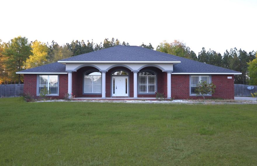 Just Reduced! Looking for a beautiful stately custom home on a large private lot? Look no further! This home has all the extra room and storage you could want including a walk-in pantry, dining room, office, huge sunroom, and 3 bathrooms. Other features you will enjoy are trey ceilings, plant ledges, recessed lighting, a fireplace and a beautiful showpiece kitchen complete with custom cabinetry and granite countertops. Enjoy the outdoors and peace and quiet! Great location just off Hwy 87, minutes to Navarre Beach or I-10.