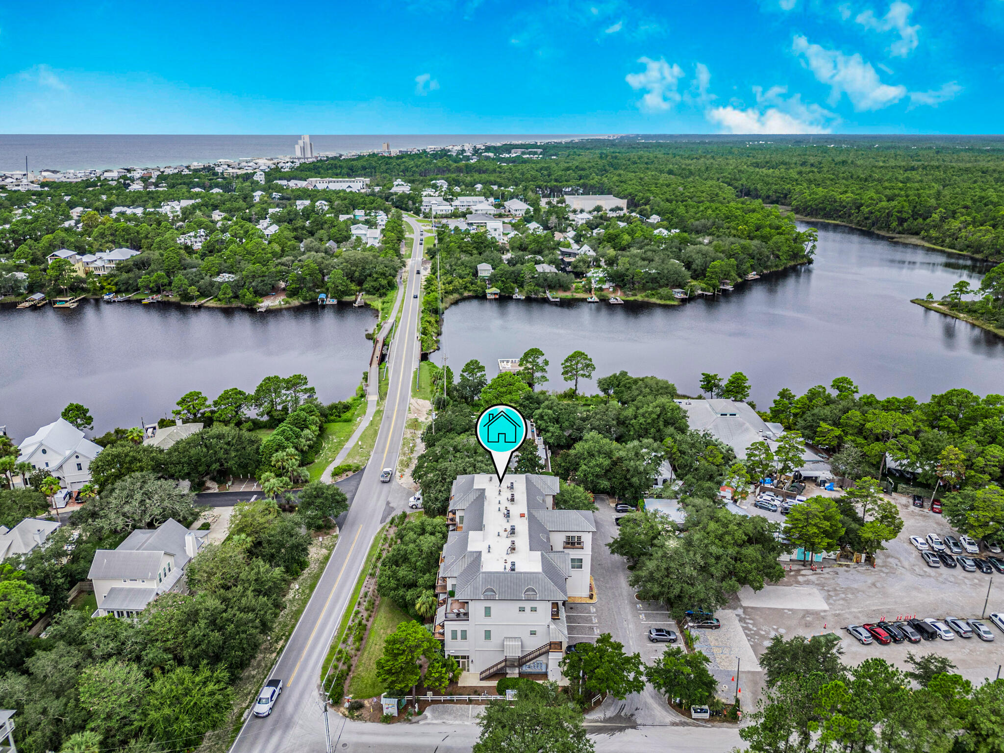 : Welcome to 5231 East County Highway 30A, Unit D, Santa Rosa Beach, FL - a modern, fully furnished waterfront retreat with 2,669 sq. ft. ofluxurious living space. Located in Eastern Lake Village, this property would make the perfect primary, secondary, or a vacation rental! Close proximity to30A's beautiful beaches and popular restaurants, this property has it all! This motivated seller presents a stunning 4-bedroom, 3.5-bath home with 10ft highceilings, 8ft interior doors, hardwood flooring, and so much more! This beautiful property perfectly blends contemporary design with coastal elegance.Entering through the inviting foyer, you'll find an open-concept living area adorned with hardwood floors and expansive windows that frame breathtakingwaterfront views The gourmet kitchen features top-of-the-line appliances including a gas stove and sleek countertops, ideal for both casual meals and entertaining.

The primary suite offers a serene escape with a luxurious en-suite bathroom, while three additional bedrooms provide ample space and comfort. Enjoy the convenience of in-unit laundry, air conditioning, and much much more!
