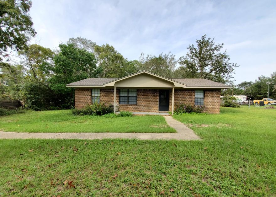 Welcome home! Adorable 3 bedroom 1.5 bath home for sale near juniper Lake in Defuniak Springs. This rancher style home sits on a HUGE .5 acre lot and features a brand new roof. Spacious kitchen with breakfast bar. Recently updated appliances. Indoor laundry room. Good sized bedrooms. This property would make the perfect family home or income producing property. Vacant and easy to show!