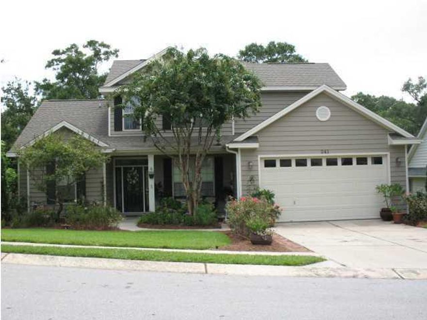 Beautiful custom home built by Key Lime Construction. New hardwood floors installed in 2014 downstairs. This lovely 4 bedroom 2.5 bath home flows easily with spacious family room which has raised trayed ceiling, recessed lighting, gas fire place and surround sound. Kitchen features nice size pantry, stainless appliances, built in microwave,gas stove/oven.breakfast bar and a nice size breakfast room. Master bedroom is down with 3 bedrooms upstairs. Hardwood floors downstairs with tile in Kitchen area. Lush landscaping surrounds home with a large private backyard which backs up to wooded area.