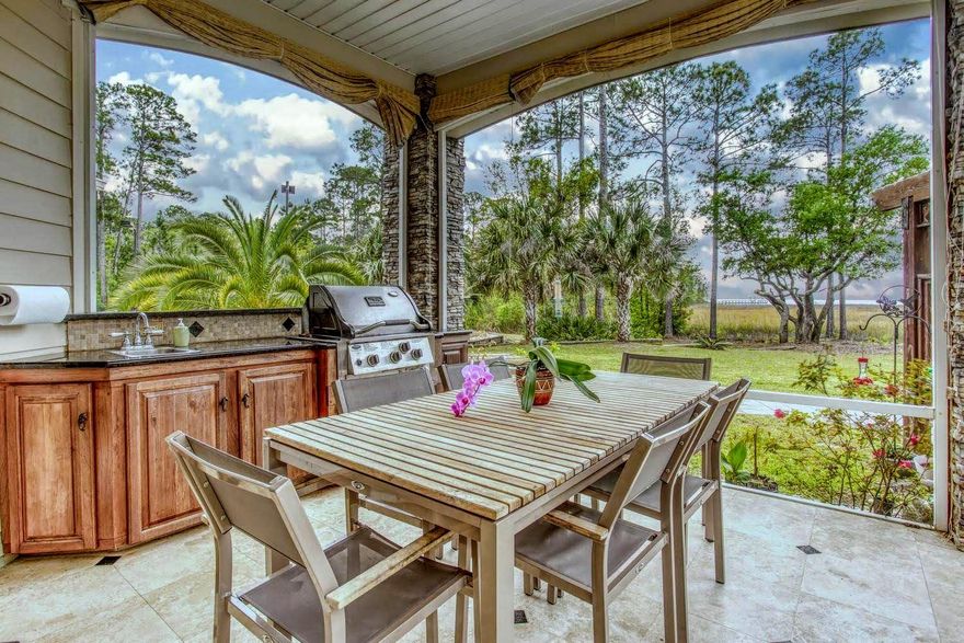 Beauty & the Bay! Entertain poolside in your summer kitchen & relax indoors with bay views from every room!