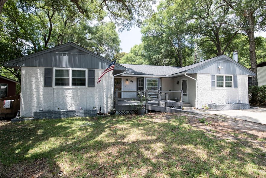 Opportunity for you to own close to Eglin Air Force Base. New Roof 2019, New Water Heater 2019, New flooring in kitchen 2019, new counters 2019 and New Sink & Faucet 2019. All new paint on exterior May 2019. Original hardwood floors throughout the main house and bedrooms. Only carpet is in the addition. Main family room has bay window and looks out onto the front porch and yard. Not one but 2 great storage closets along the hallway. It is a split bedroom plan with 3 bedrooms on the main side of the home and a master in the addition. Kitchen has a pantry as well for storage and new bottom cabinets.No more hand washing your dishes as the owners put in a new dishwasher just this past month.Dining area is beside the kitchen. Family room with wood burning fireplace.