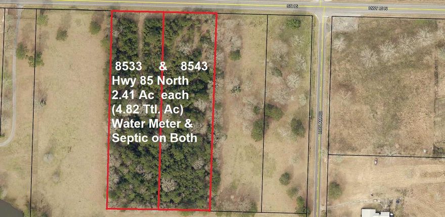 Two 2.41 ac parcels, for a total of 4.82 acres, on paved Hwy in Laurel Hill. Both lots were previous homesites with power septic and public water (seller makes no warranty on existing utilities). These are nice, lightly wooded lots surrounded by farmland and would make great homesite(s) for your dream home or to have manufactured home(s) set up on.