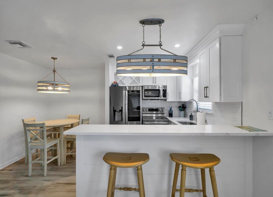 Beautifully upgraded townhome with garage,  walking distance to beach. No detail was spared in this unit, from the coordinating furniture to the Italian tile with Schluter flooring underneath, the sound proofing of the walls and waterfall quartz countertops. Holiday isle has been a long time favorite for many reasons. Water enthusiasts hit the jackpot here. Holiday Isle offers easy access to some of the most spectacular water activities in the region. Whether it's deep-sea fishing, jet skiing, paddleboarding, or simply splashing in the emerald waters, there's no shortage of aquatic adventures. Experience the magic of Holiday Isle in Destin. A place where every day feels like a vacation day.  Holiday Isle is a favorite spot for travelers seeking paradise on the Emerald Coast