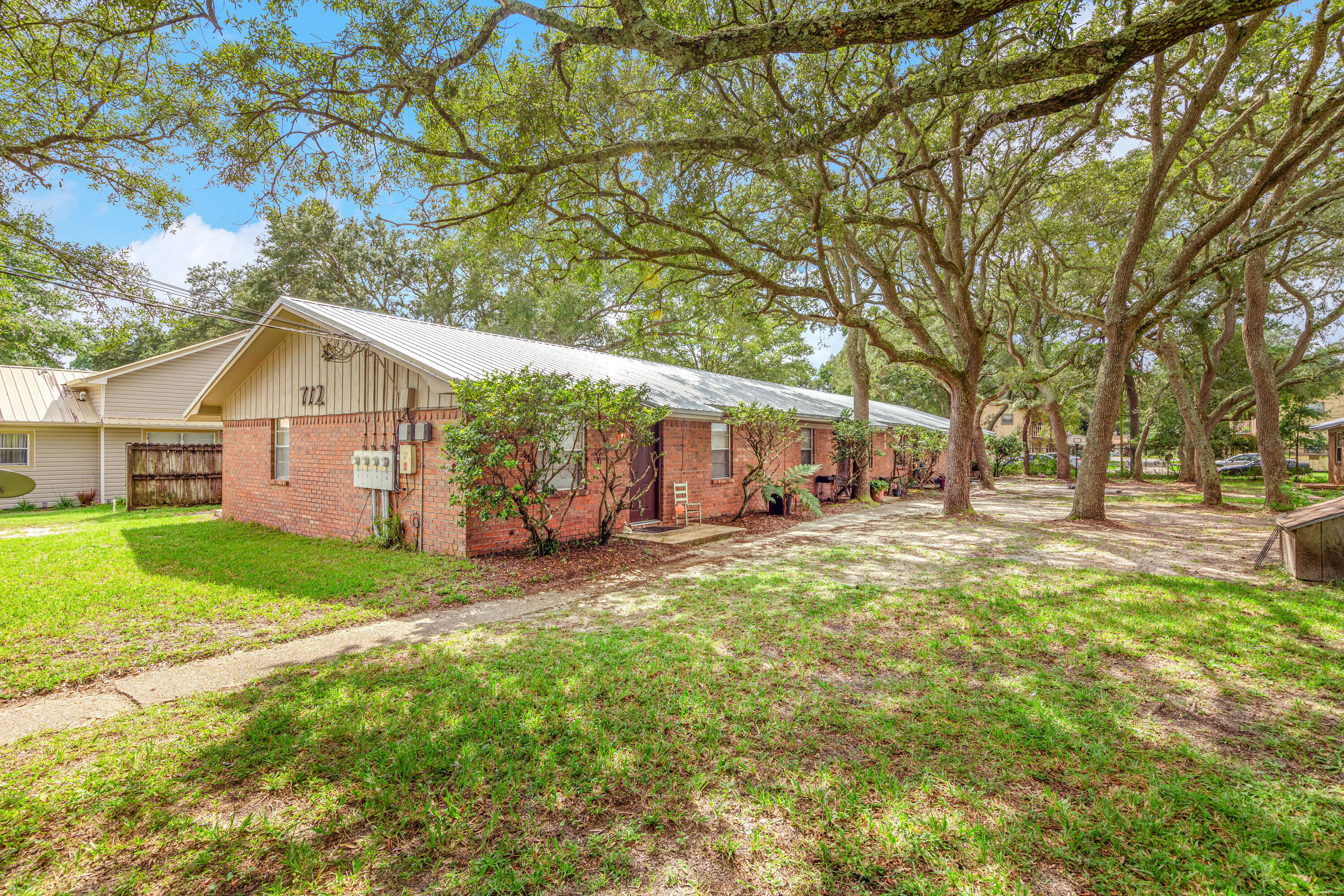 ***Attention Investors*** Fourplex in heart of FWB. Very well maintained Income Producing Properties. Each unit is 2 bedroom 1 bath, 900 sq.ft. with a full kitchens. The property boasts a 2021 METAL ROOF! There is plenty of parking and a large common area for the tenants. Laundry room with Washer & Dryer hook ups are located in each unit as well unit has brand new light fixtures and faucets. All units have newer paint, cabinets, flooring, and fixtures. Units A-E are for sale as well. Call with any questions.