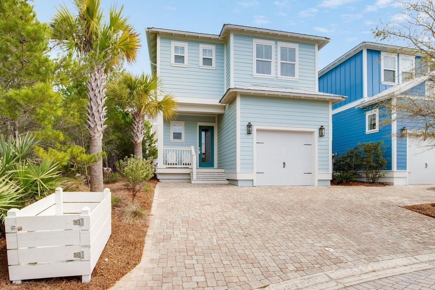 Perched over 60 feet above sea level in the heart of Blue Mountain Beach, this fully-furnished home captures the essence of Florida living. Spend your days on sugar-white sands, savoring local cuisine, or lounging poolside in the coastal breeze.A paved front drive offers guest parking, while the oversized garage accommodates a vehicle along with storage for bikes and beach toys. Inside, the open-concept great room features stylish flooring and tasteful decor. The kitchen boasts granite countertops, white cabinetry, sleek black appliances, and space to entertain with a large dining table and breakfast bar.A newly added paver patio with a built-in firepit expands the living space outdoors--ideal for evening gatherings, s'mores, or simply relaxing. With four bedrooms and four full baths, the home comfortably accommodates guests. The first floor includes a guest room with access to a full bath. Upstairs, there's another guest suite with a private bath, a bunk room with a TV for the kids, and a serene master suite with a king bed, walk-in closet, and ensuite with double vanity. A full-sized washer and dryer add everyday convenience.

Enjoy community amenities just steps away, including a resort-style community pool, outdoor kitchen, fire pit, multi-story outlook tower, and lounge seating. Walk or bike the paved path along 30A to your favorite boutiques and eateries in neighboring Blue Mountain Beach, Grayton Beach or Seaside, and try your hand at paddleboarding and kayaking on nearby coastal dune lakes.