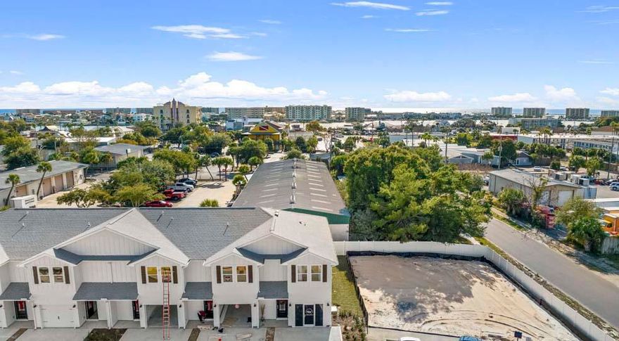 Welcome to Harbor Place Townhomes! This community located at the corner of Melvin St. and Azalea Dr. in Destin, FL. Just minutes from Emerald Grand and Crab Island. These 3 bed, 2.5 bath town homes have EVP flooring throughout the entire home, including stairs and carpet in all bedrooms. Features include: farmhouse style sink, stainless appliances,  quartz countertops and beautiful white cabinetry with brushed nickel hardware. This is an interior town home unit, only one neighbor. Perfect location to get to the beach, shopping, restaurants and the elementary school in under 10 minutes! ***Home is NOT furnished. Photos are stock and colors, upgrades and selections may differ.